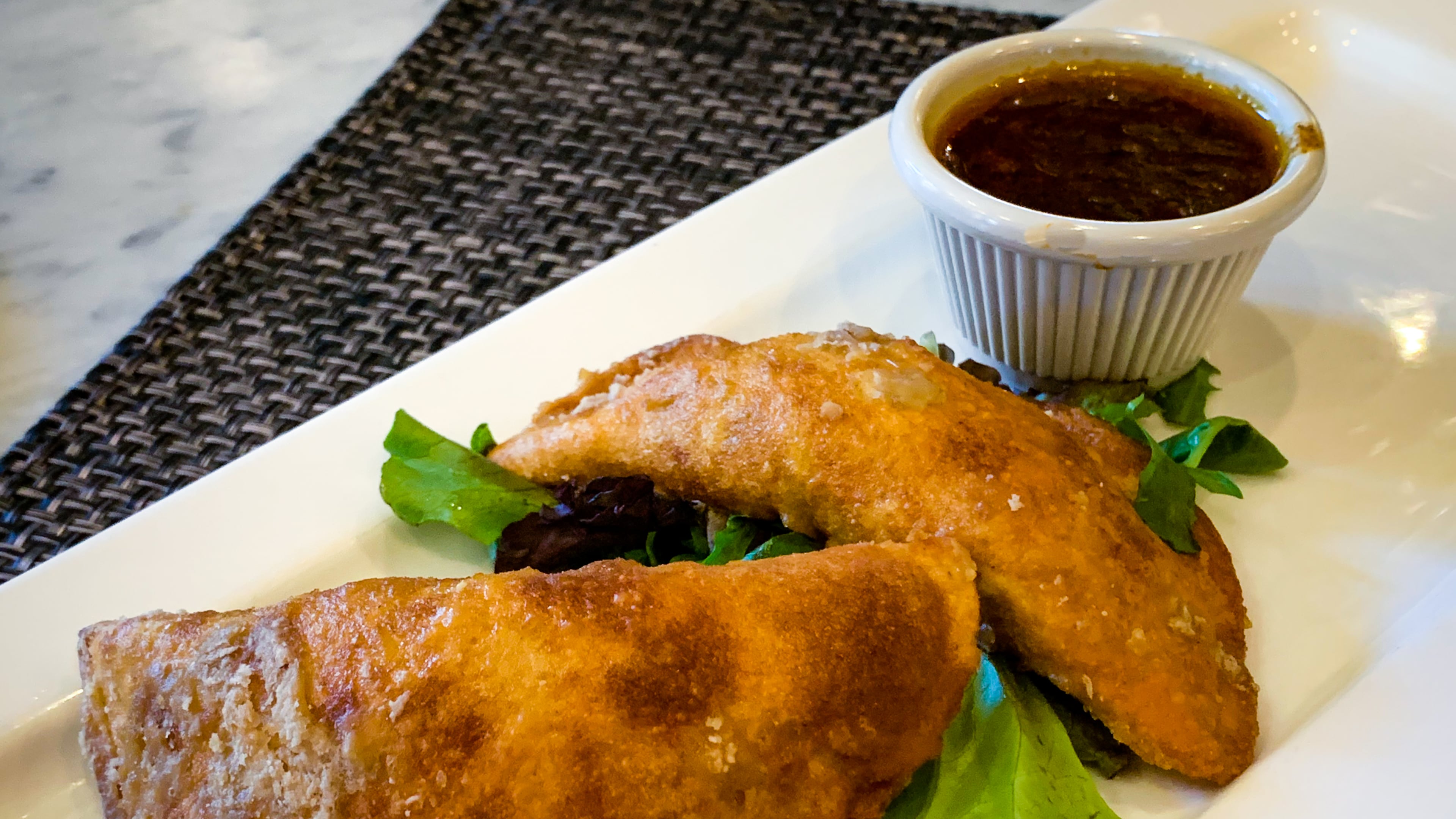 The oxtail empanadas are a meaty, delicious Jamaican specialty at Negril Village.