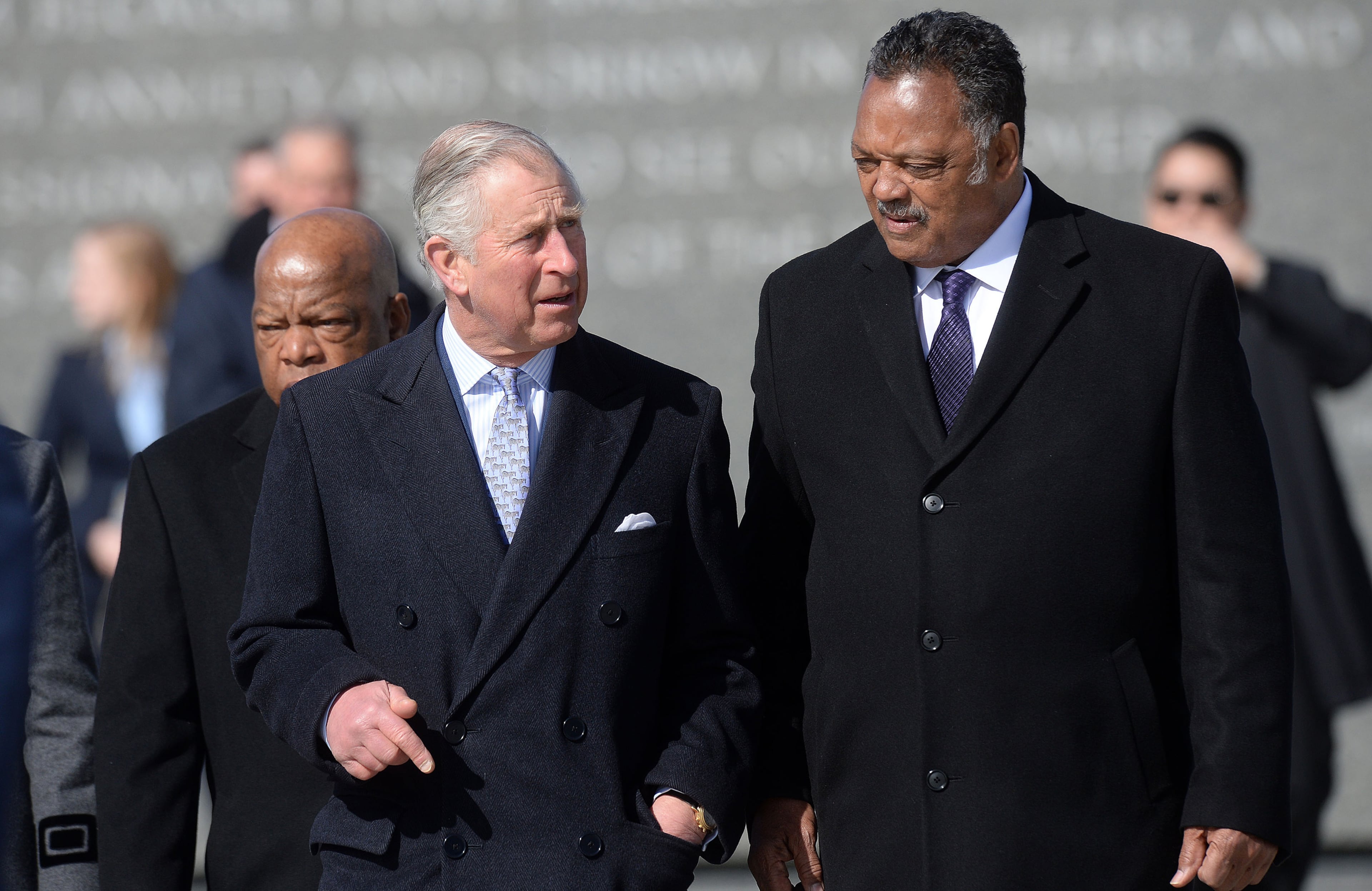 Britain's Prince Charles, Prince of Wales, flanked by Congressman John Lewis and Reverend Jesse Jackson visit the Martin Luther King Jr. Memorial on March 18, 2015 in Washington, D.C. The Prince of Wales and The Duchess of Cornwall are in the United States for a four-day visit. (Olivier Douliery/TNS)