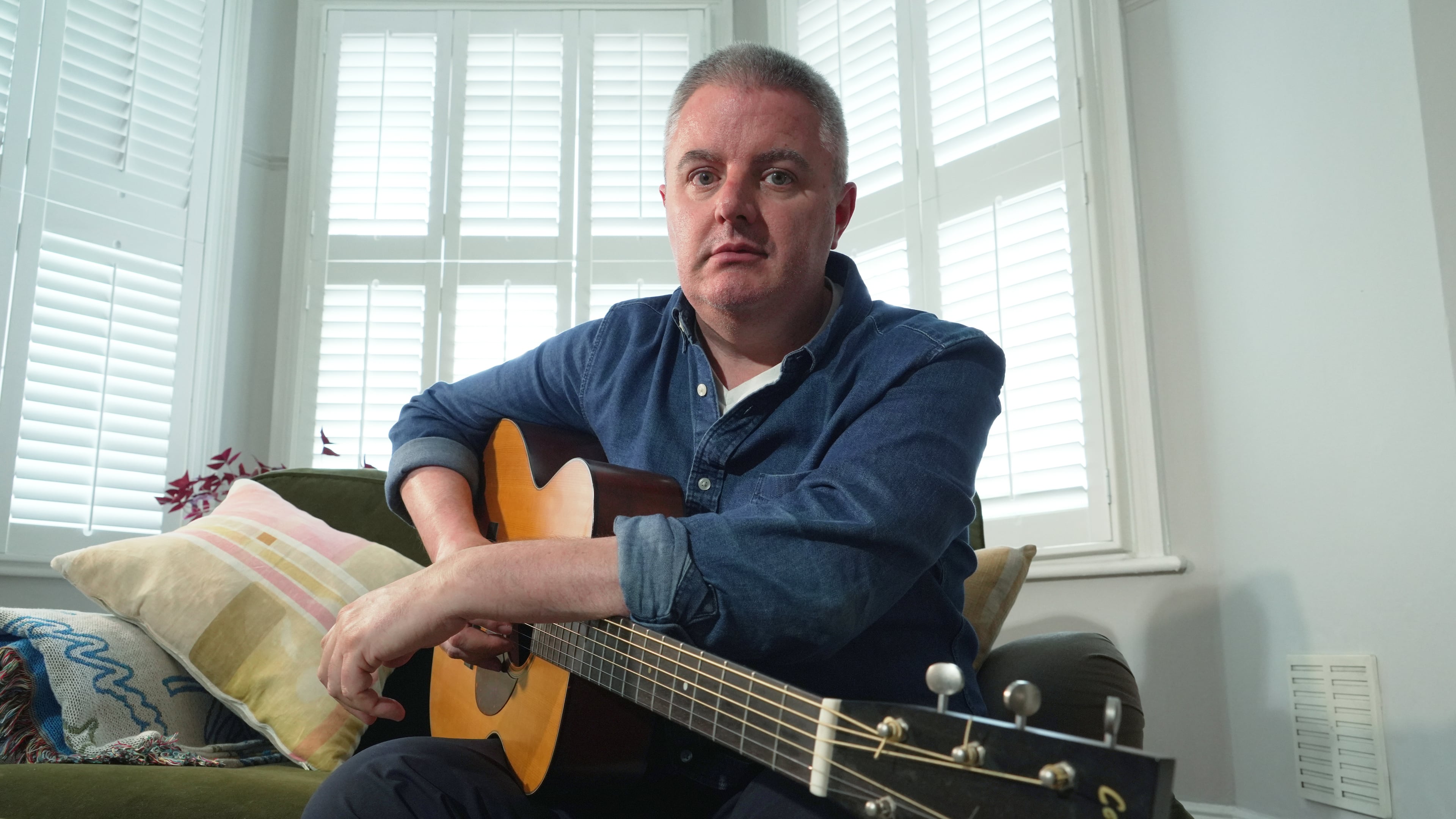 Musician Samuel Smith poses for a photo at his home, in London, Tuesday, May 12, 2026. (AP Photo/Mustakim Hasnath)