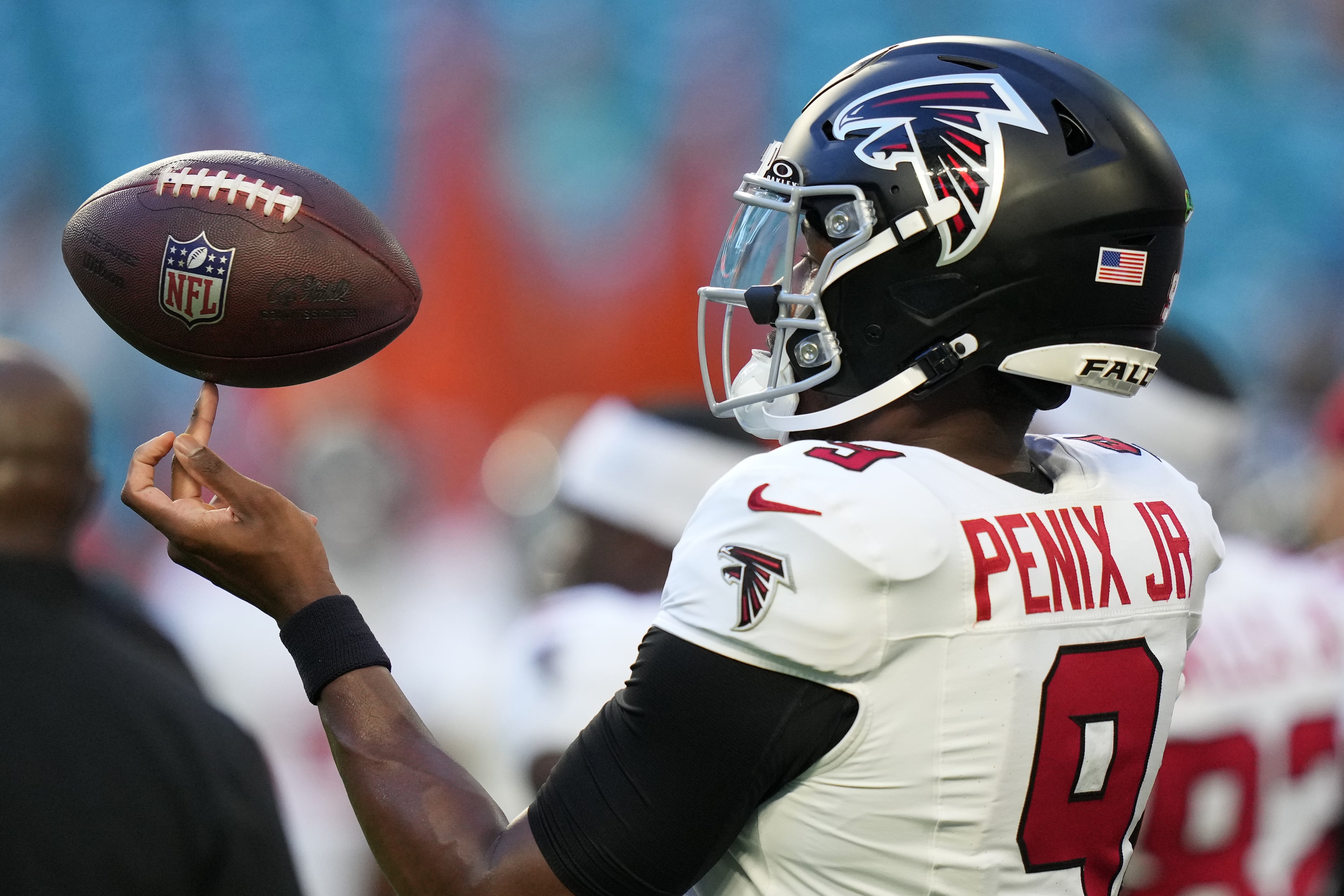 Atlanta Falcons quarterback Michael Penix Jr. spins a ball on his finger while warming up before an NFL preseason football game against the Miami Dolphins, Friday, Aug. 28, 2026, in Miami Gardens, Fla. (AP Photo/Lynne Sladky)