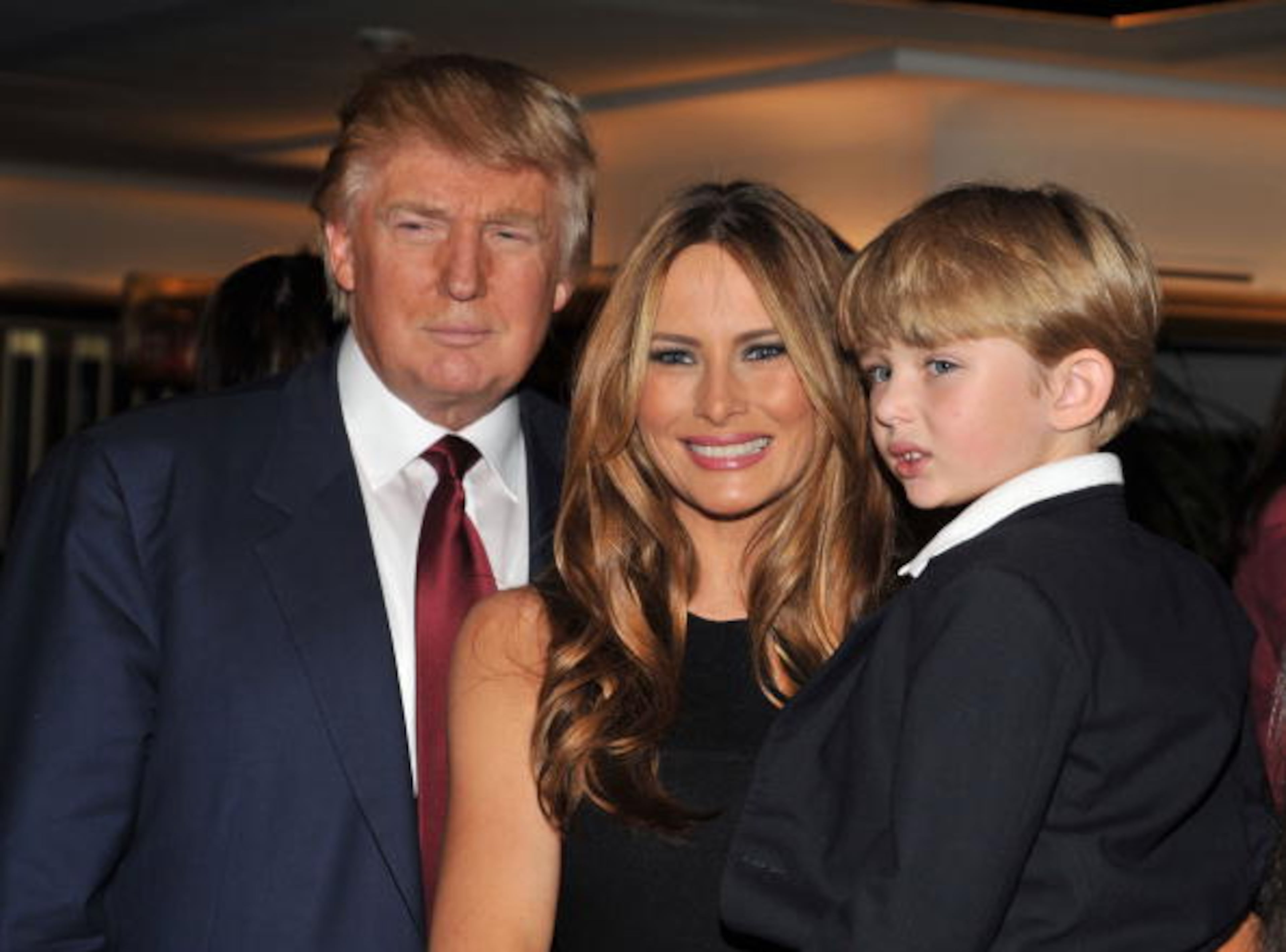 NEW YORK - OCTOBER 14: Donald Trump, Melania Trump-Trump and Barron Trump attend the "The Trump Card: Playing to Win in Work and Life" book launch celebration at Trump Tower on October 14, 2009 in New York City. (Photo by Andrew H. Walker/Getty Images)