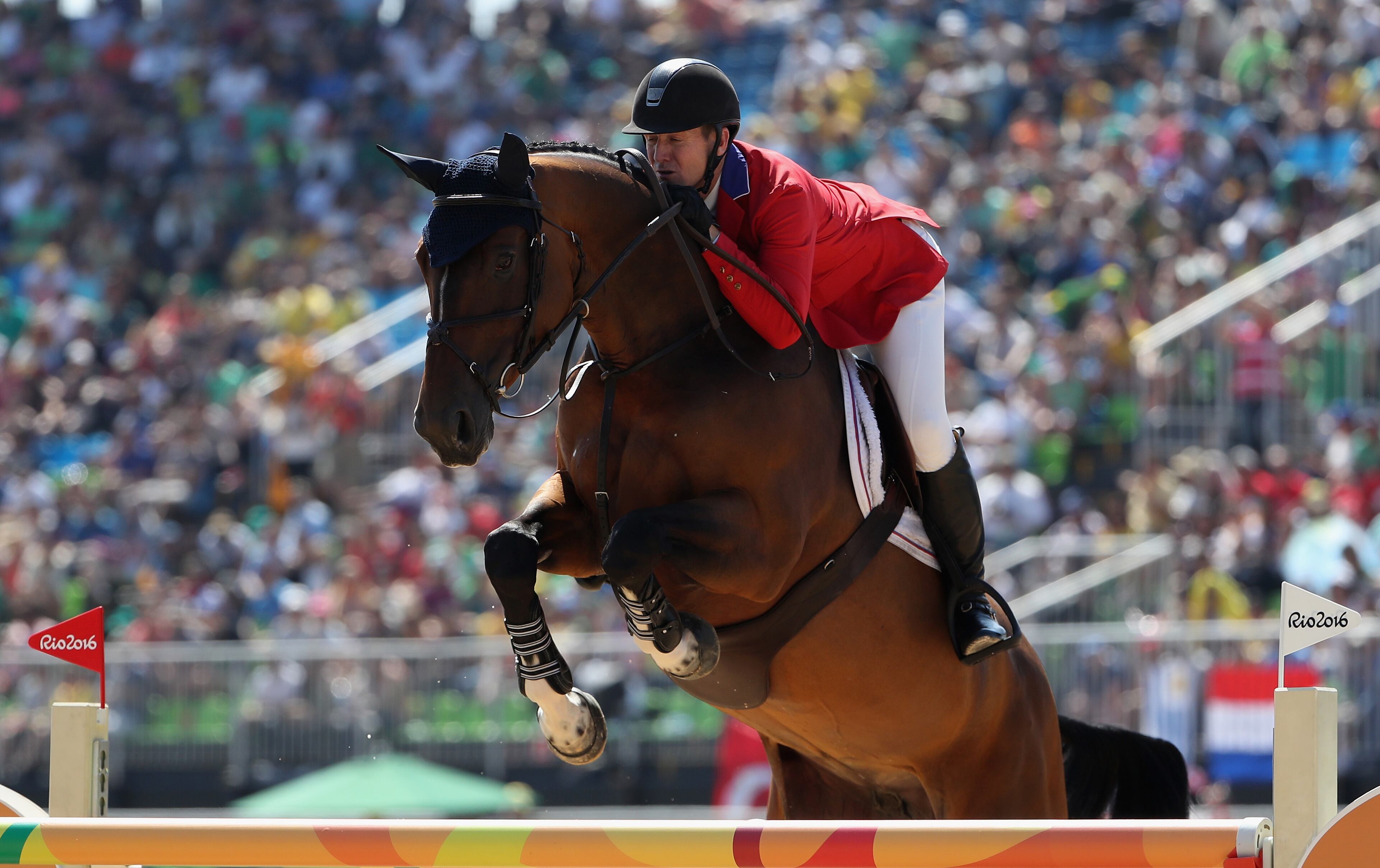 RIO DE JANEIRO, BRAZIL - AUGUST 14: McLain Ward of United States riding Azur competes during the Jumping Individual and Team Qualifier on Day 9 of the Rio 2016 Olympic Games at the Olympic Equestrian Centre on August 14, 2016 in Rio de Janeiro, Brazil. (Photo by Christian Petersen/Getty Images)