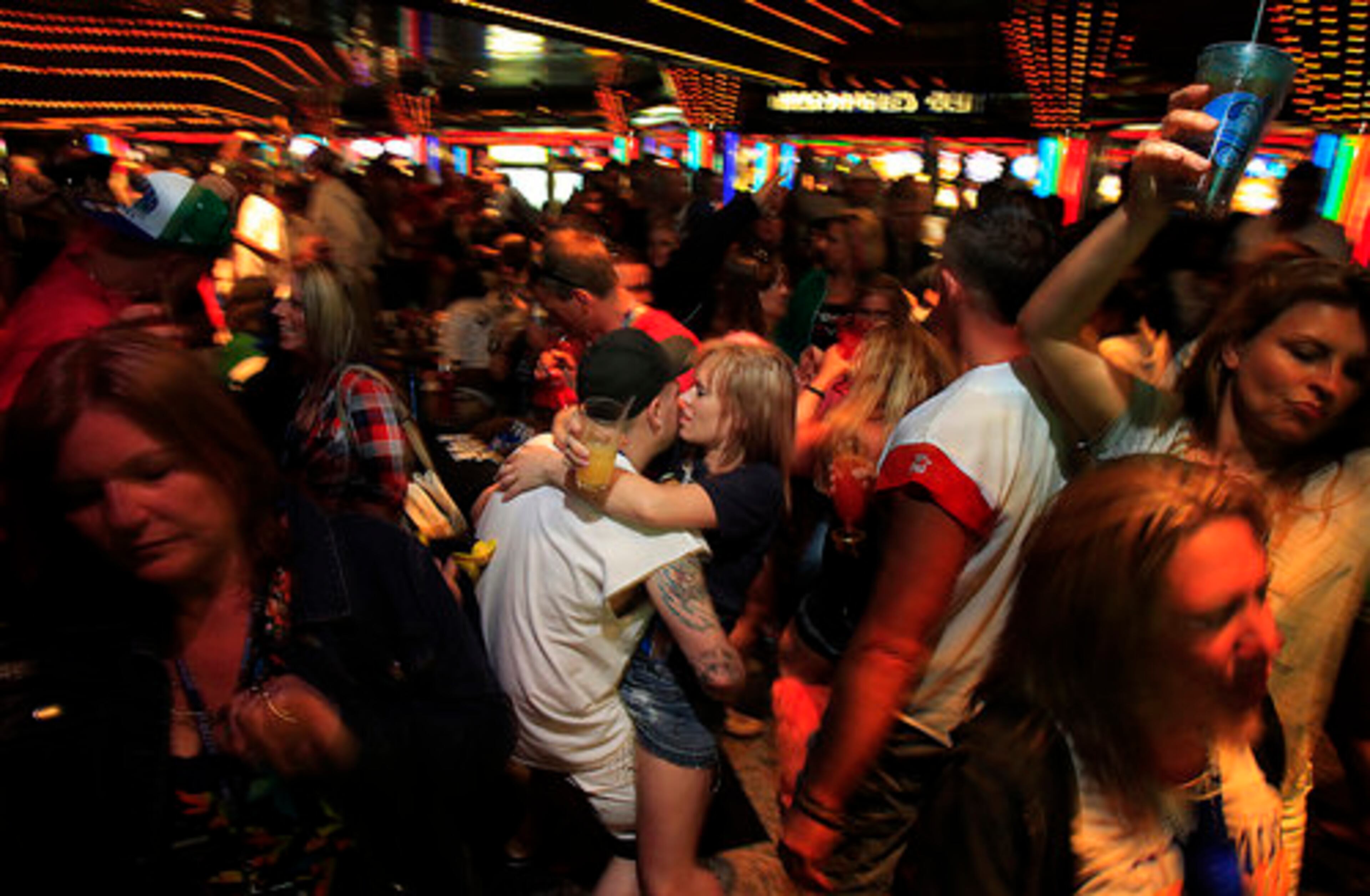 Fans crowd the Carnival Destiny casino.