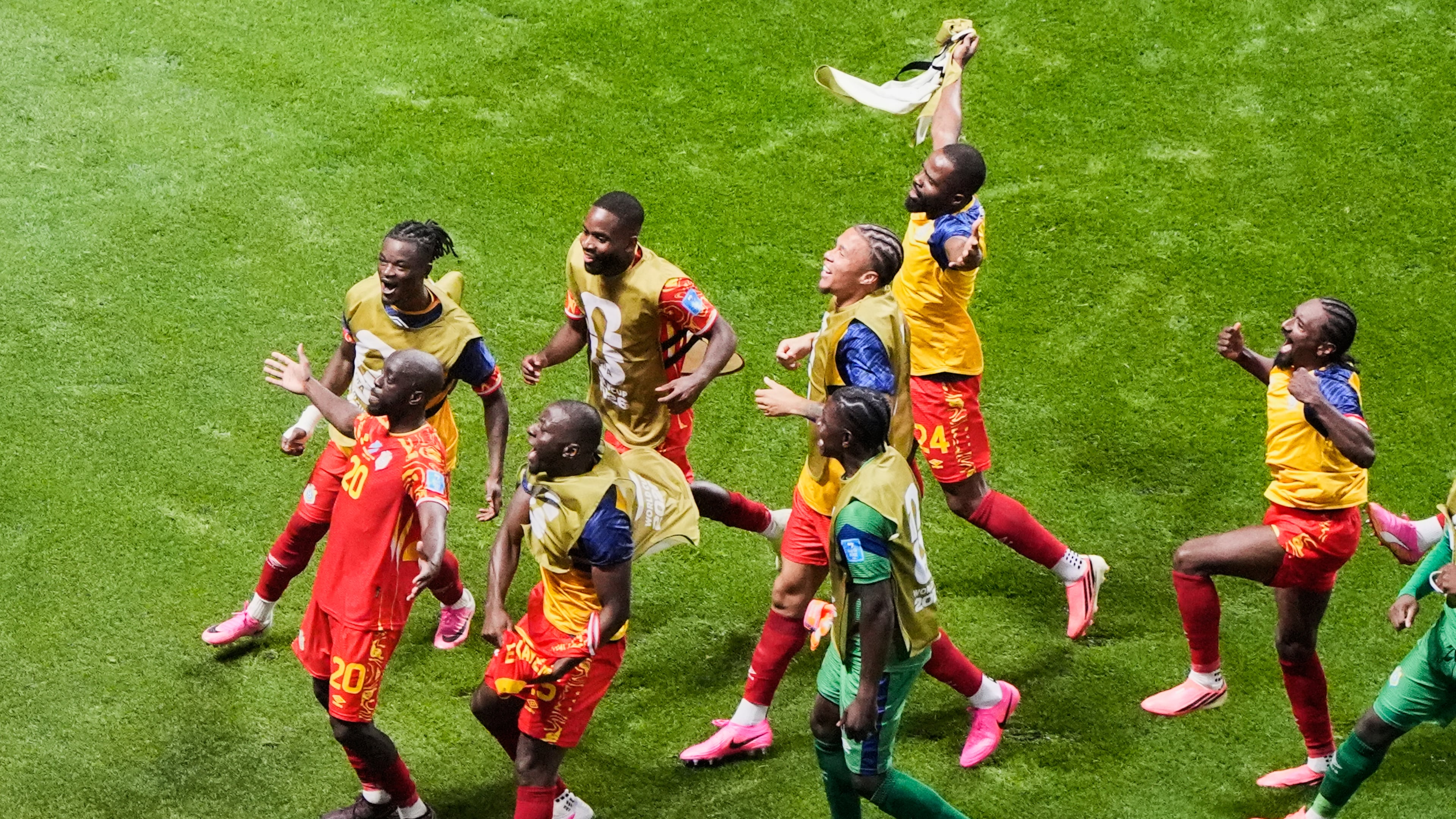 Congo's Yoane Wissa (20) celebrates with teammates after scoring their third goal during the World Cup Group K soccer match between DR Congo and Uzbekistan in Atlanta, Saturday, June 27, 2026. (AP Photo/Mike Stewart)