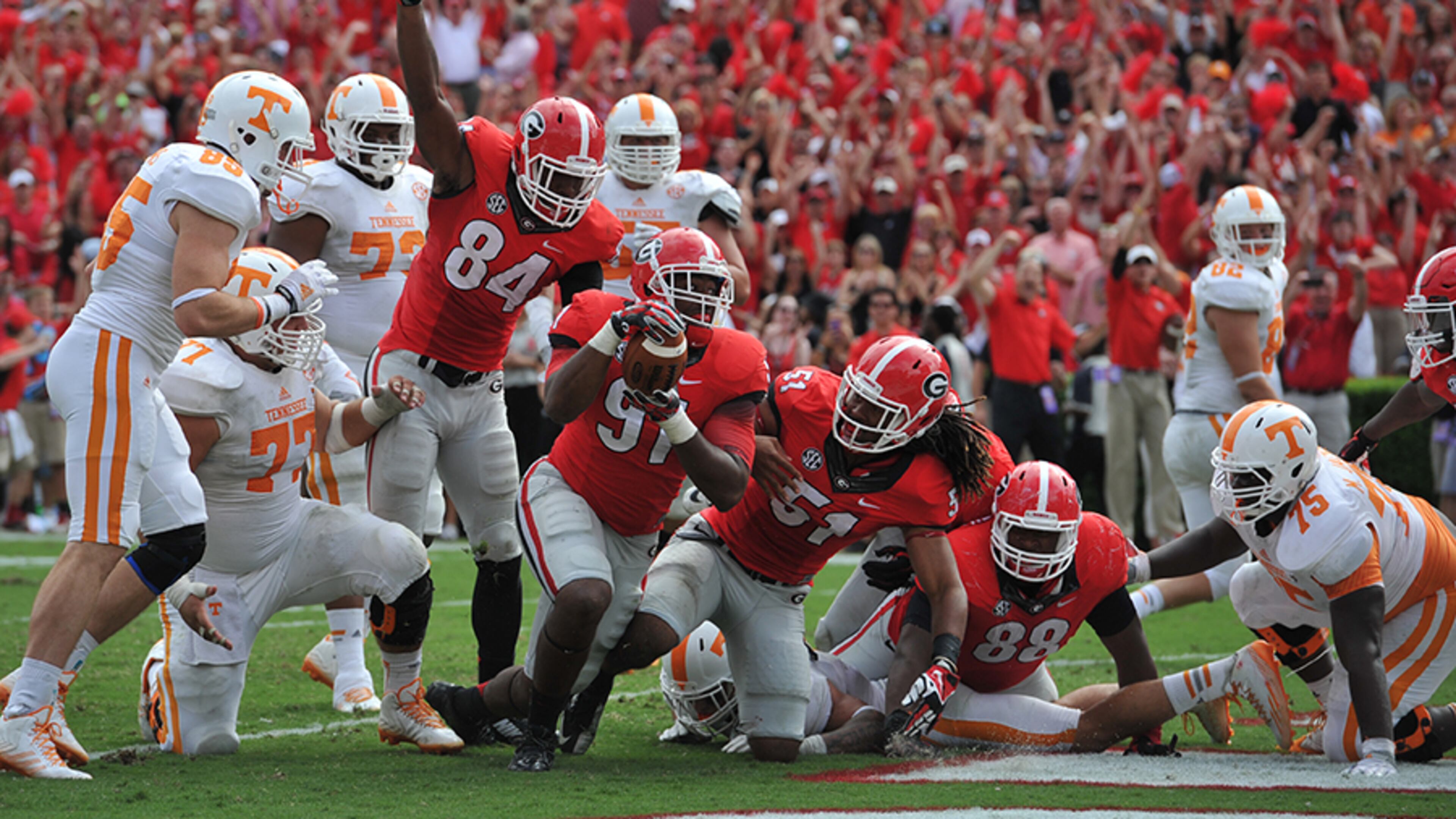 The Bulldogs relished defeated the Vols this season, but come Saturday they'll be rooting hard for a Tennessee victory over Missouri - because that would clinch a berth in the SEC Championship game for Georgia.