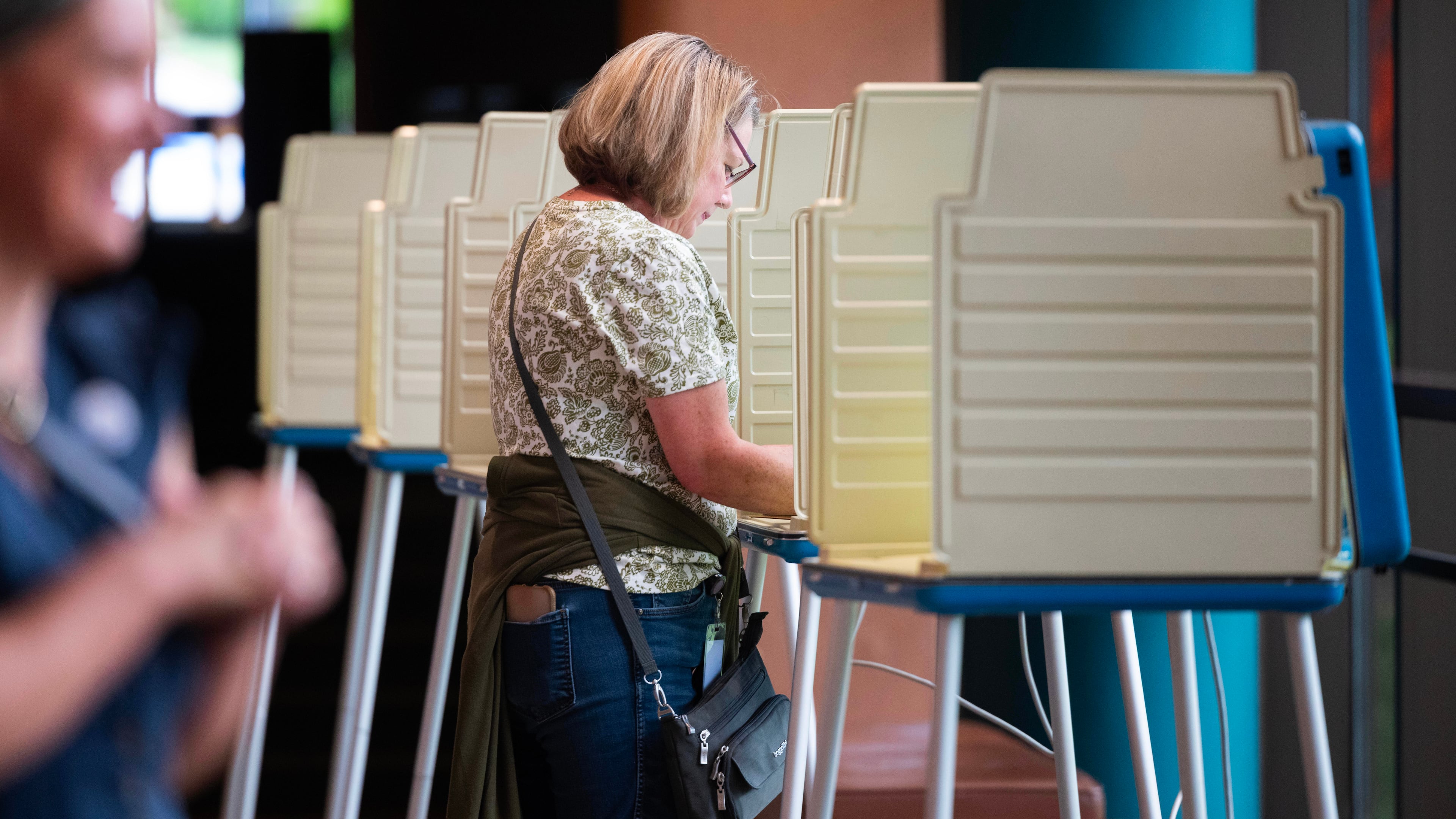 Megan Green fills out her ballot in the Nebraska Primary Election at Omaha Community Playhouse Tuesday, May 12, 2026, in Omaha, Neb. (AP Photo/Rebecca S. Gratz)