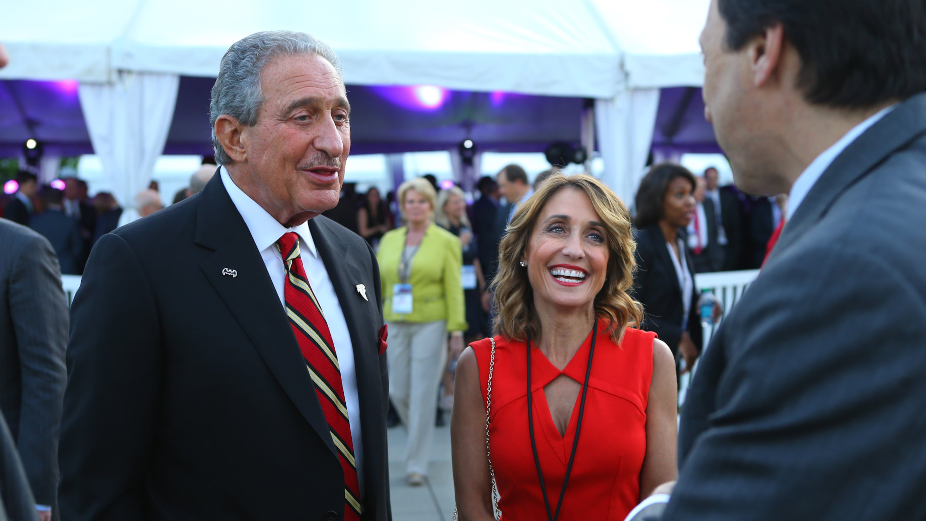 Falcons owner Arthur Blank and his wife Angie Macuga Blank greet guests as they arrive for the official groundbreaking ceremony of the new Falcons stadium at the Georgia International Plaza on Monday, May 19, 2014, in Atlanta. CURTIS COMPTON / CCOMPTON@AJC.COM