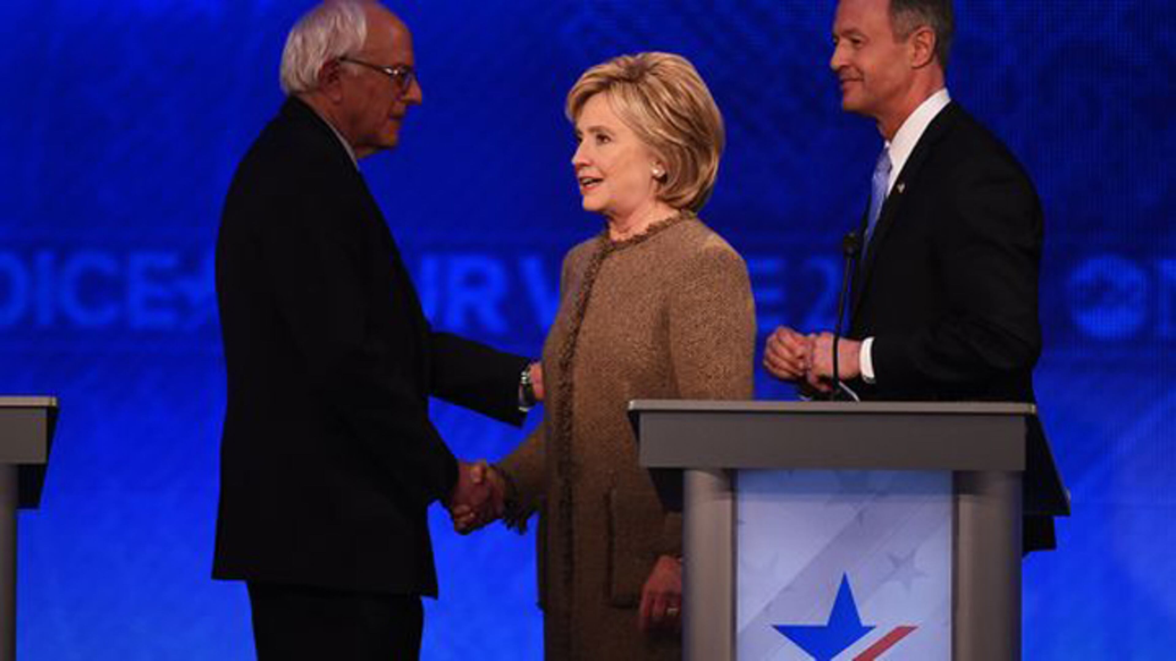 Bernie Sanders, Hillary Clinton and Martin O'Malley appear on stage at a Democratic debate in Manchester, N.H., on Dec. 19, 2015.