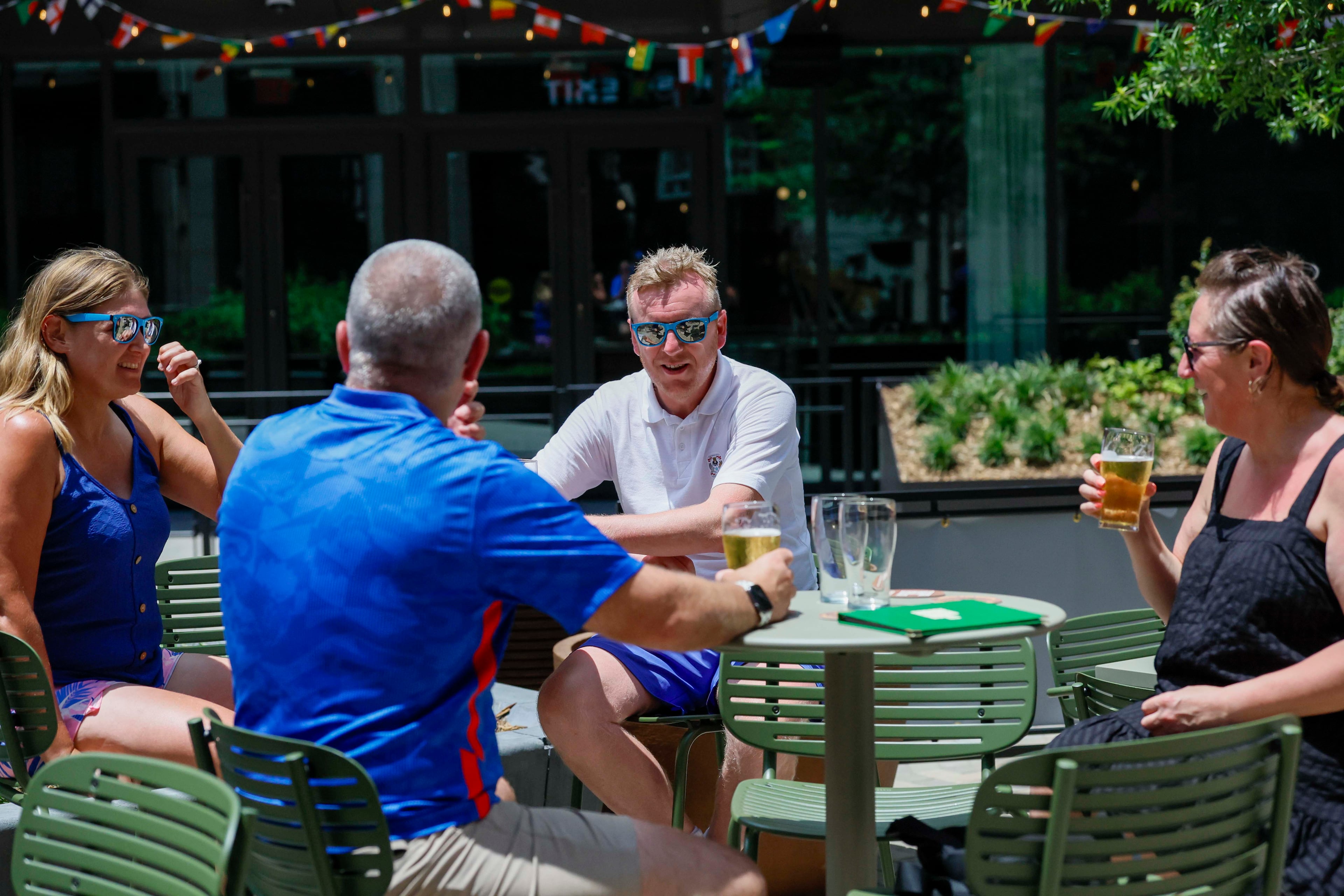 England fans visiting Atlanta for the 2026 FIFA World Cup enjoy the patio at the Irish Exit in South Downtown. (Miguel Martinez/AJC)