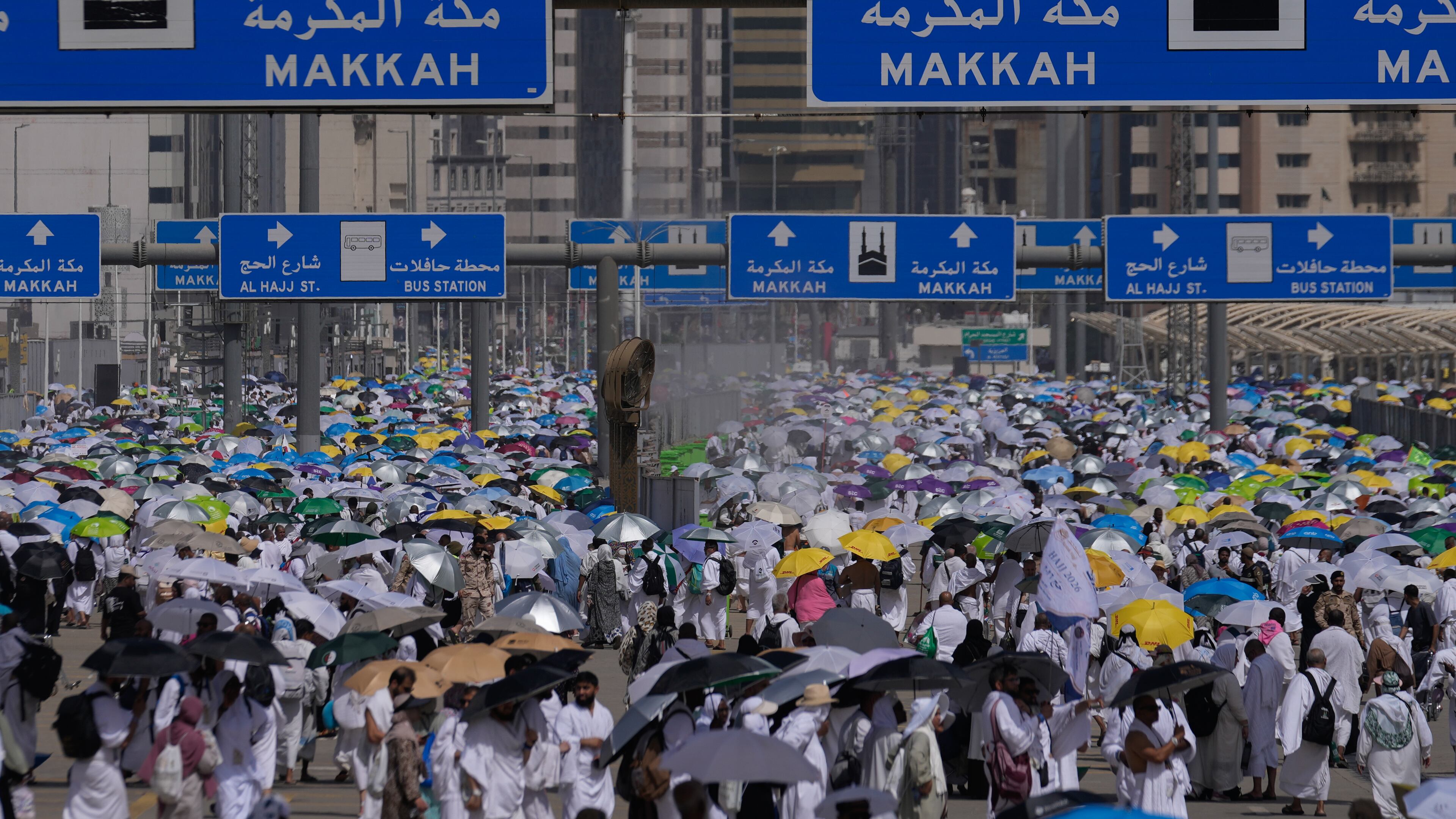 Muslim pilgrims leave after casting pebbles at pillars in the symbolic stoning of the devil, the last rite of the annual Hajj, in Mina near the holy city of Mecca, Saudi Arabia, Wednesday, May 27, 2026. (AP Photo/Altaf Qadri)