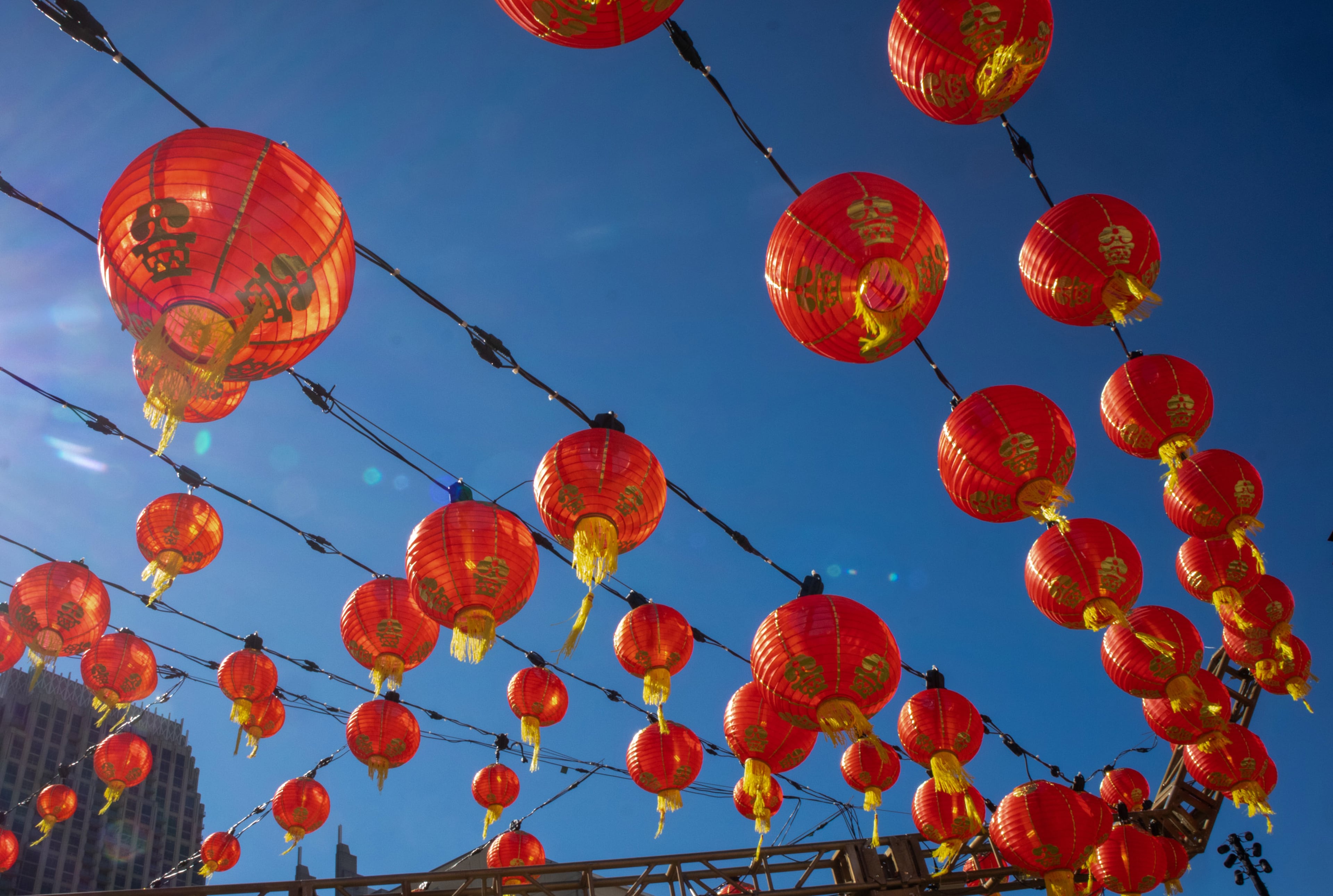 The Atlantic Green is decorated with red lanterns for the Lunar New Year celebration at Atlantic Station on Sunday, February 13, 2022. The display runs through March 8. STEVE SCHAEFER FOR THE ATLANTA JOURNAL-CONSTITUTION