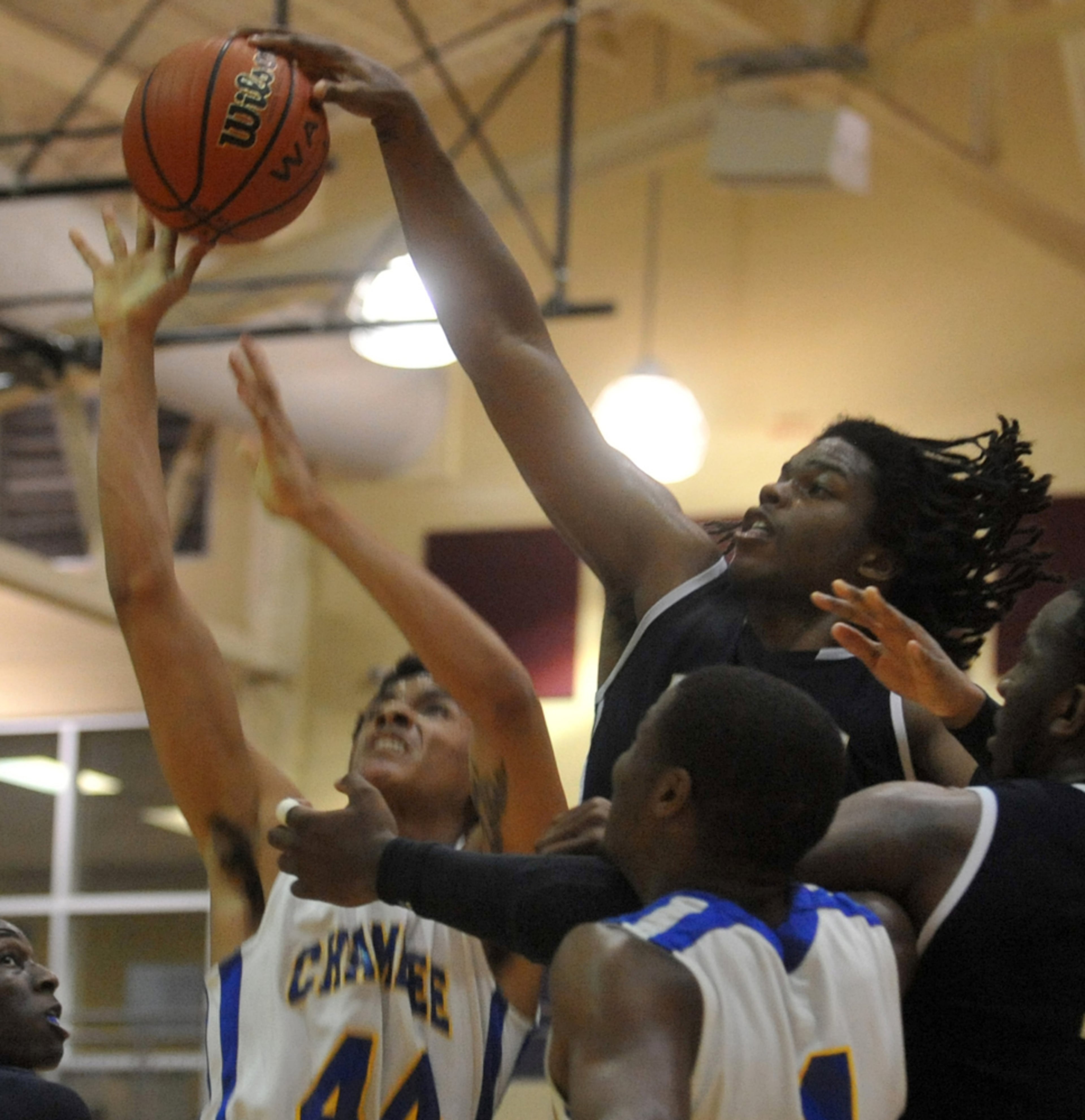 I didn� get much of a chance to shoot sports this year, but I managed to get some shots of a game or two leading into the HS playoff season. February 17, 2012 LITHONIA Chamblee's Quinton Walker #44, has his shot blocked by Southwest's William Goodwin #2, during action Friday night. Southwest Dekalb Panthers versus Chamblee Bulldogs in high school basketball action in the Region 6-AAAA basketball tournament at Miller Grove High School Friday February 17, 2012 The Panthers beat the Bulldogs 82-62. Kent D. Johnson, kdjohnson@ajc.com NIKON D3, ISO 3200, 1/250, f2.8, 70mm