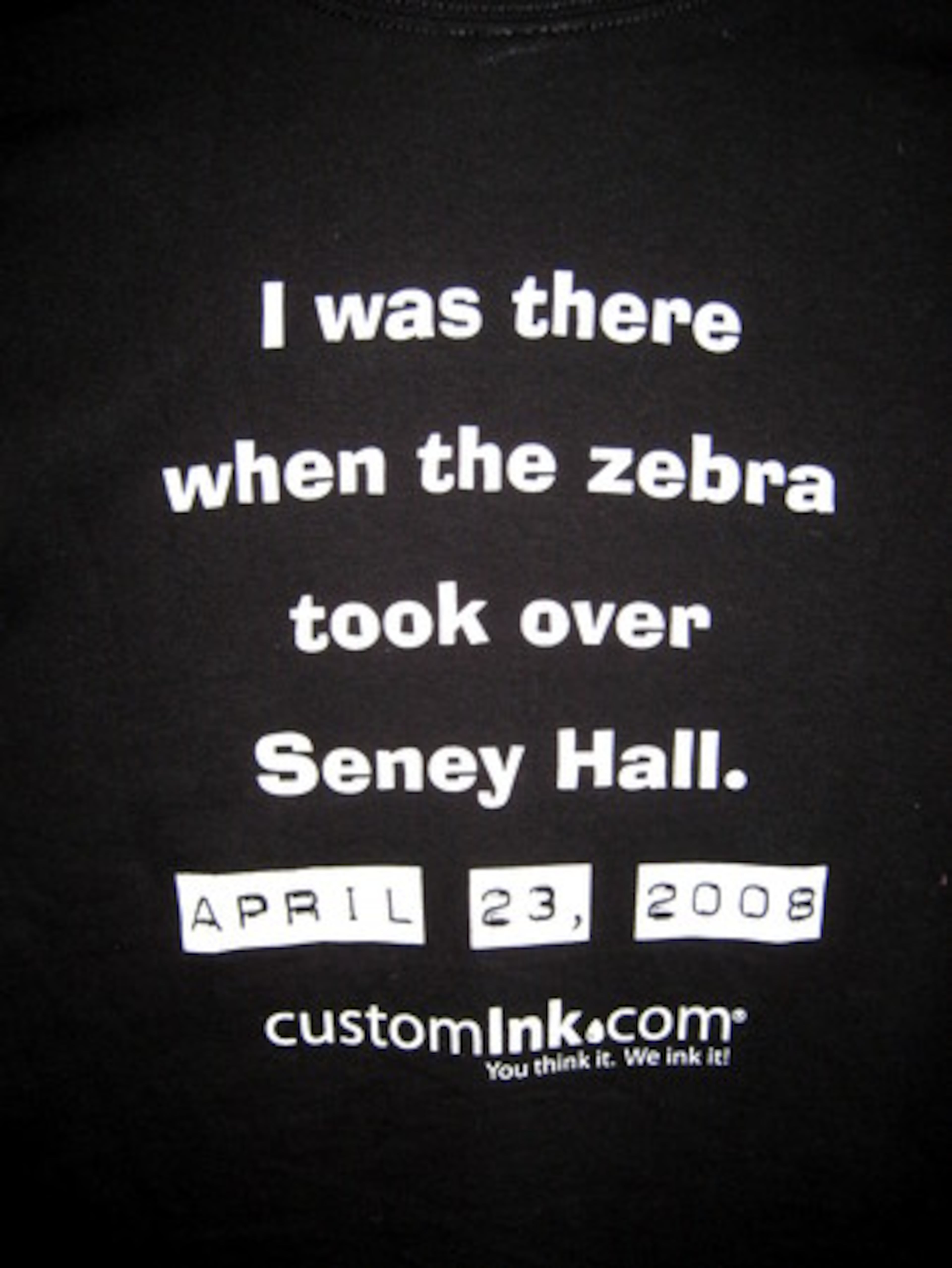 The T-shirt says....