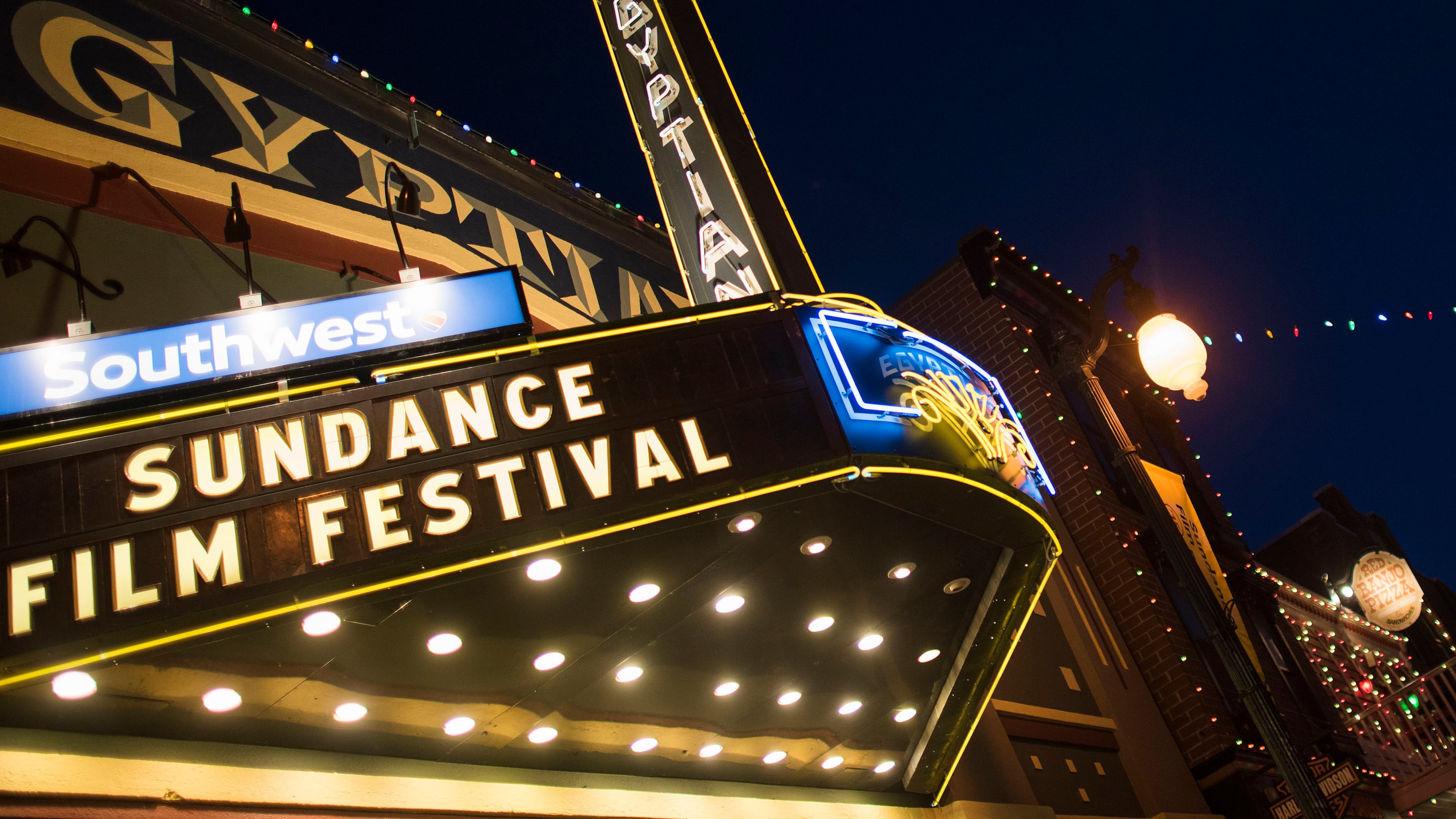 FILE - The exterior of the Egyptian Theatre is illuminated on Main Street during the Sundance Film Festival in Park City, Utah, Jan. 22, 2015. (Photo by Arthur Mola/Invision/AP, File)