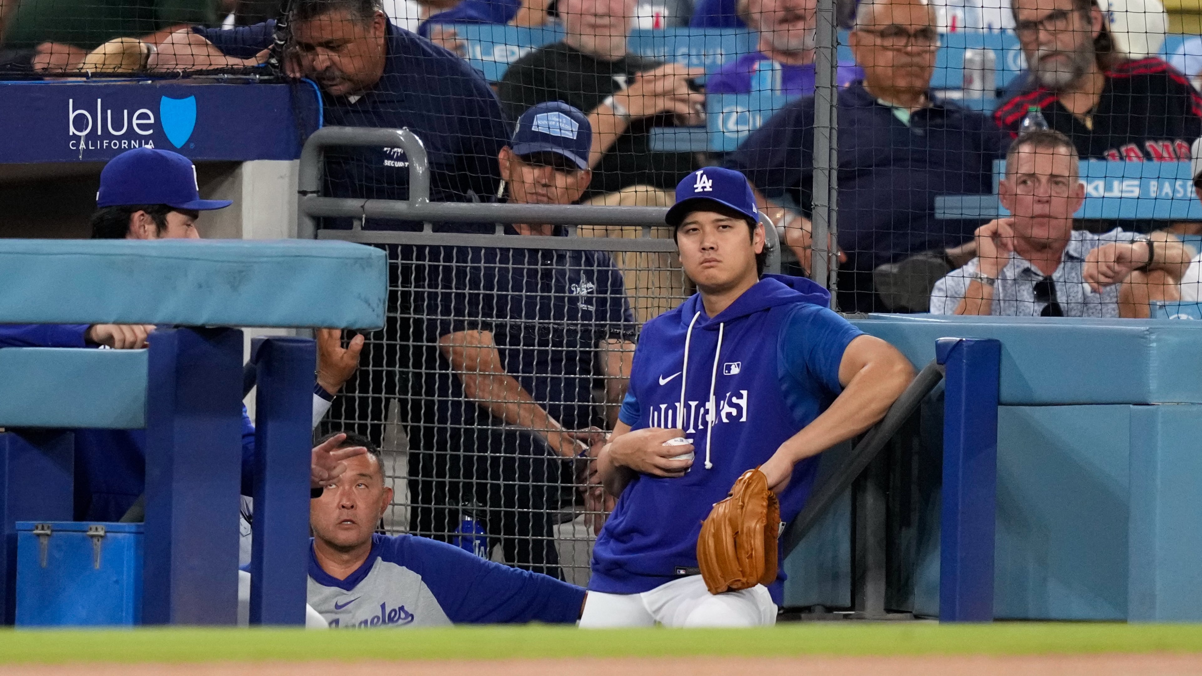 Los Angeles Dodgers' Shohei Ohtani watches from the dugout during the first inning of a baseball game against the Cincinnati Reds, Tuesday, Sept. 8, 2026, in Los Angeles. (AP Photo/Mark J. Terrill)