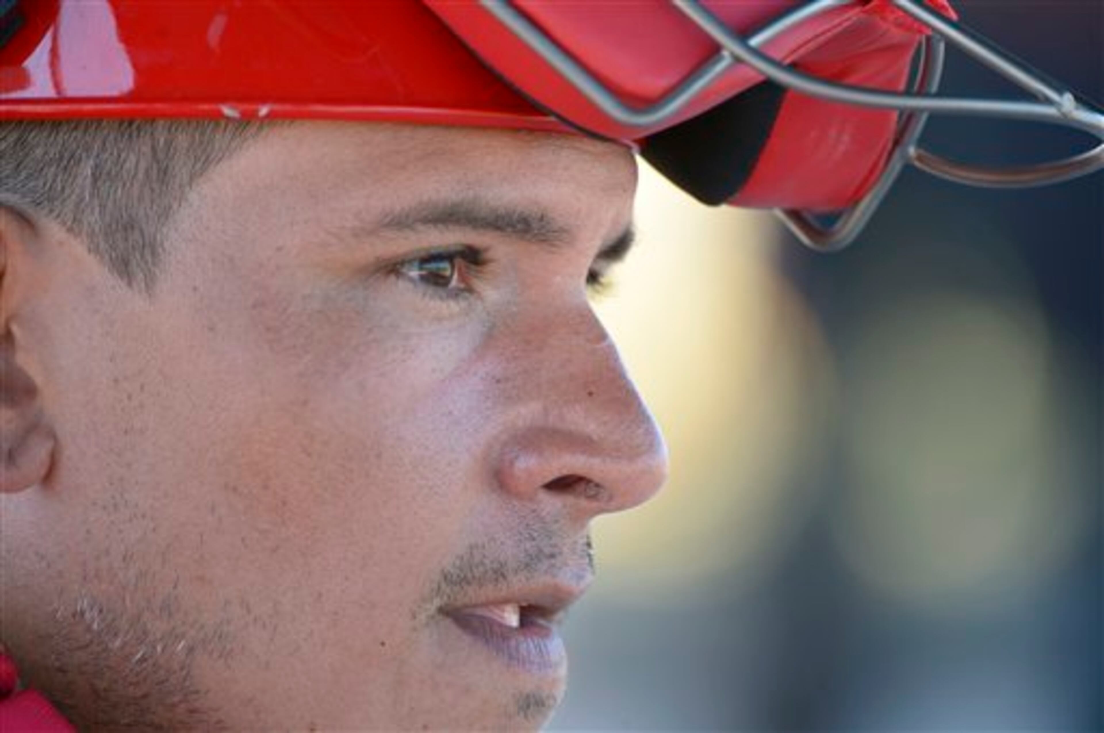 Washington Nationals catcher Carlos Maldonado watches from the dugout during a spring training baseball workout in Viera, Fla., Wednesday, Feb. 20, 2013.(AP Photo/Phelan M. Ebenhack)