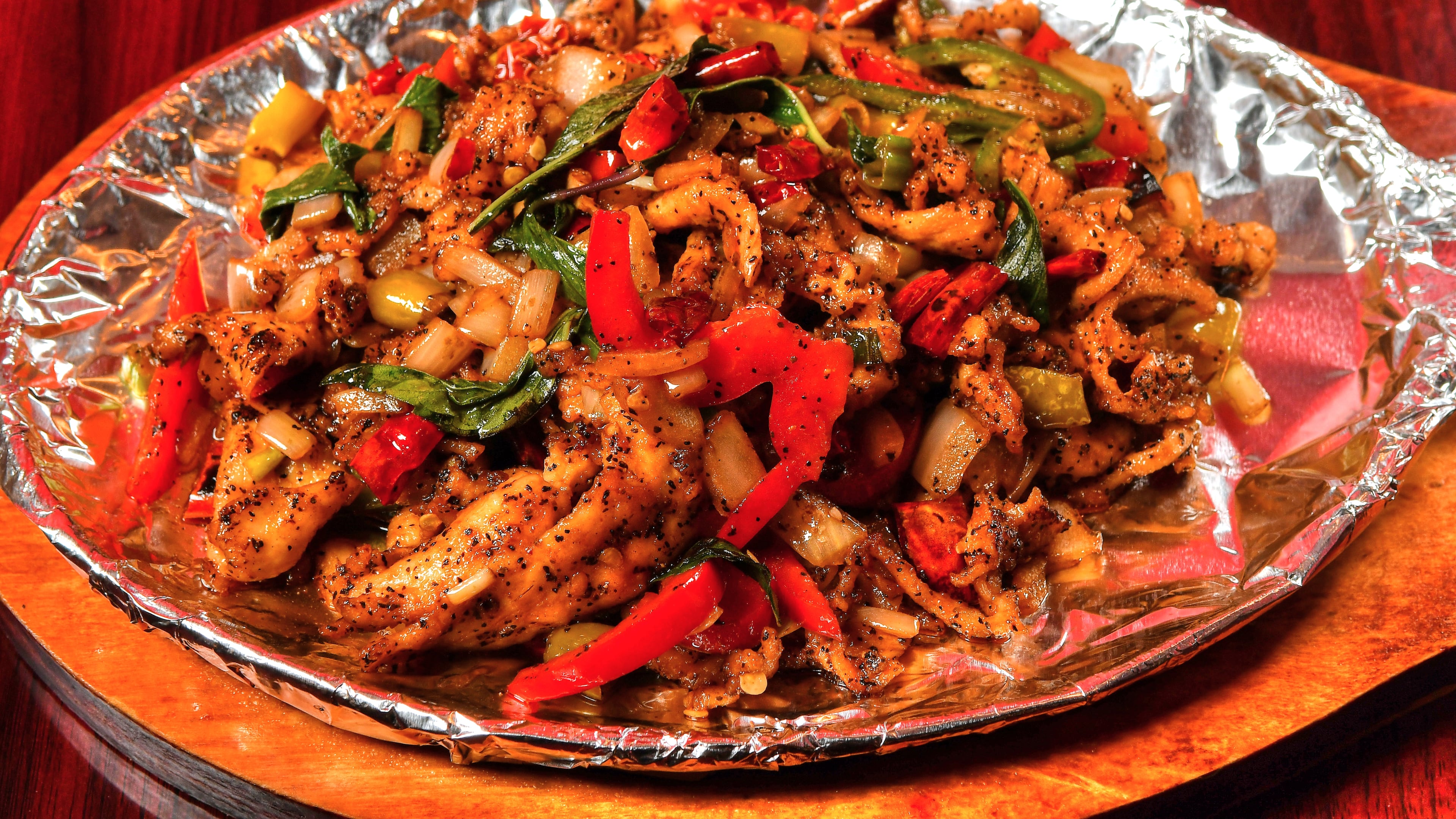 Sho Spicy’s Chicken with Three Peppers.
(Chris Hunt for The Atlanta Journal-Constitution