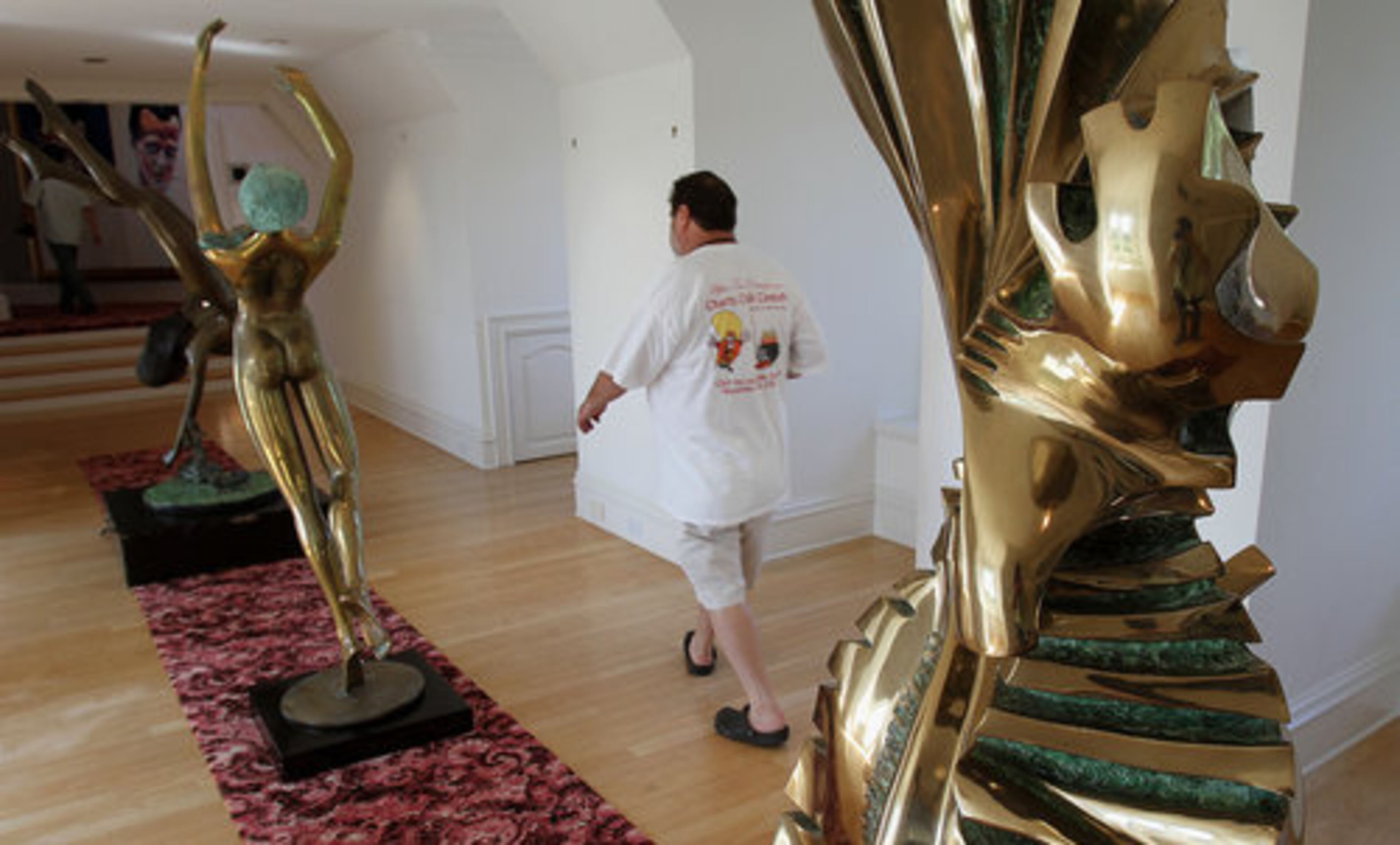 Sculptures and modern art were among items to be auctioned. Dean Gardens was originally built as the dream home of Larry Dean and his former wife, Lynda, but they separated not long after construction was completed.