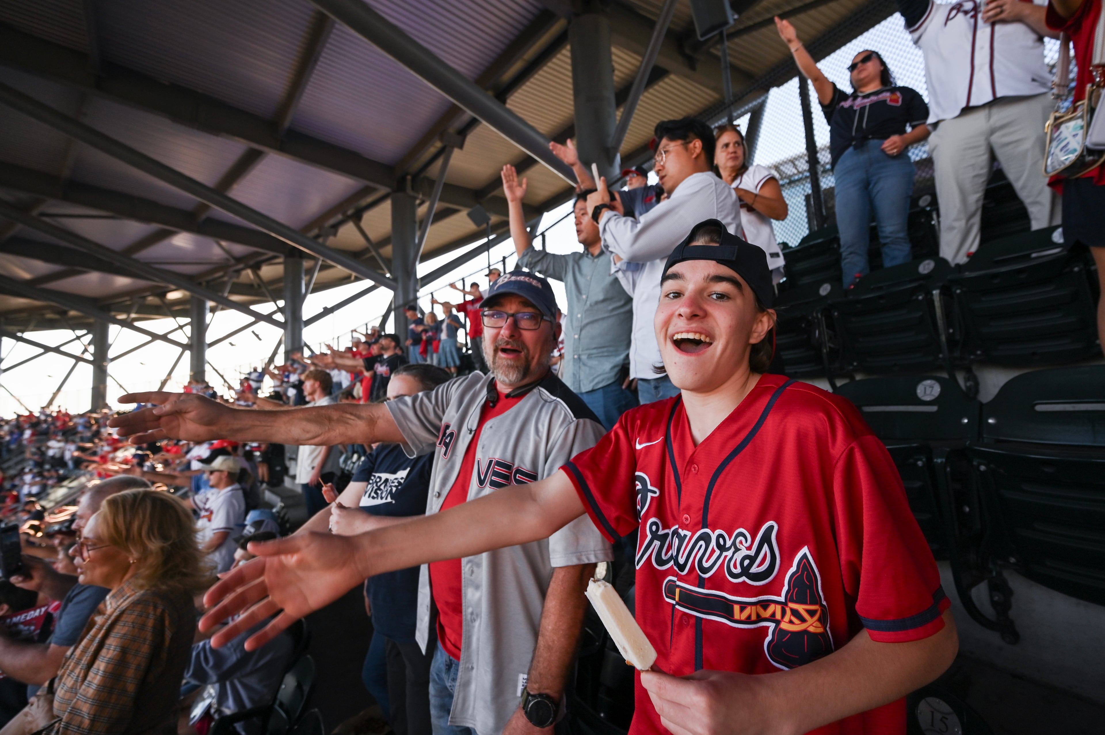 Atlanta Braves fans cheer before Game 3 of the MLB National League Division Series between the Atlanta Braves and the Los Angeles Dodgers, Tuesday, Oct. 6, 2026, in Atlanta. (Hyosub Shin/AJC)