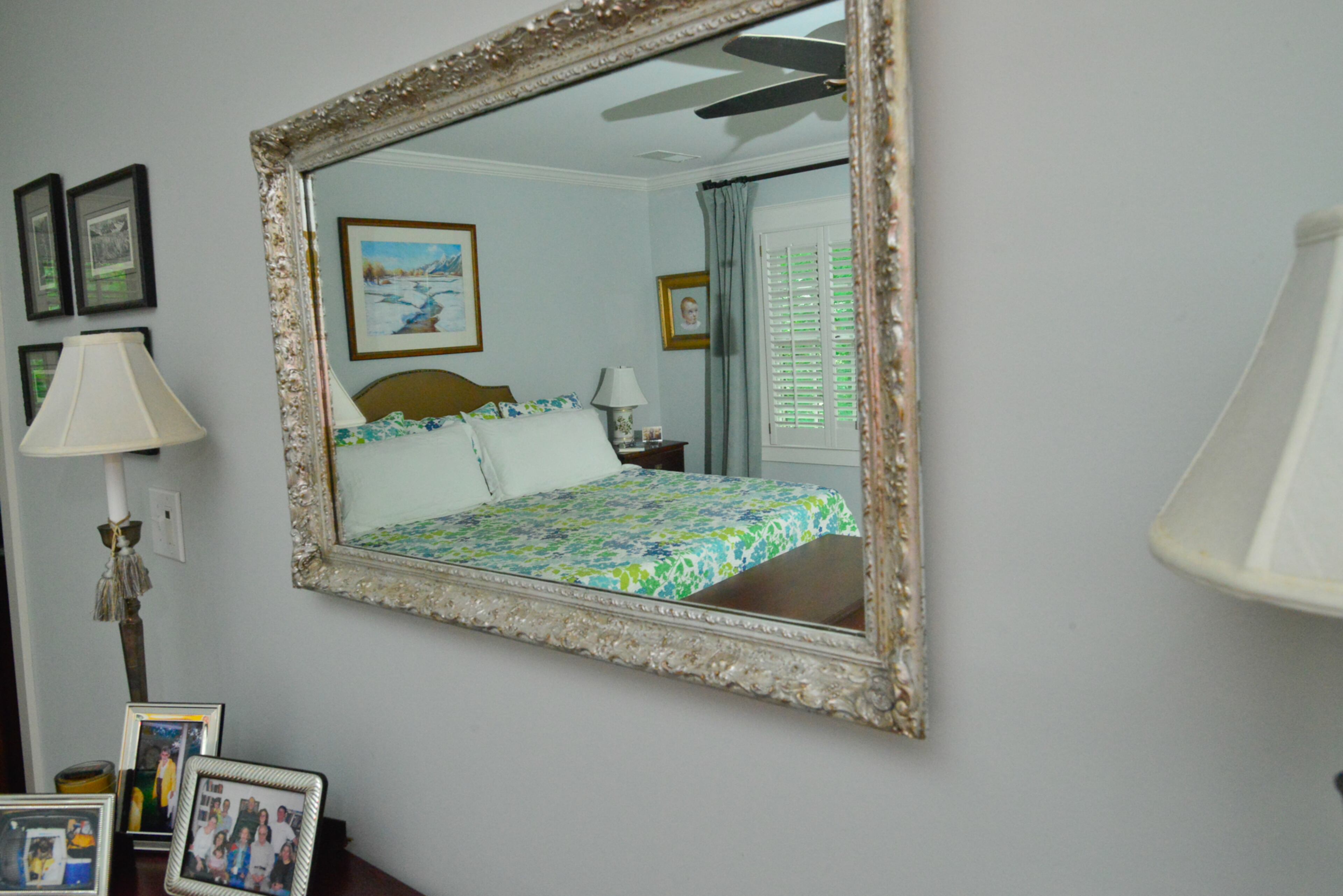 Lisa Gleim-Jonas doesn't display much of her artwork in the Buckhead home, but a landscape in the master bedroom is one of her creations.