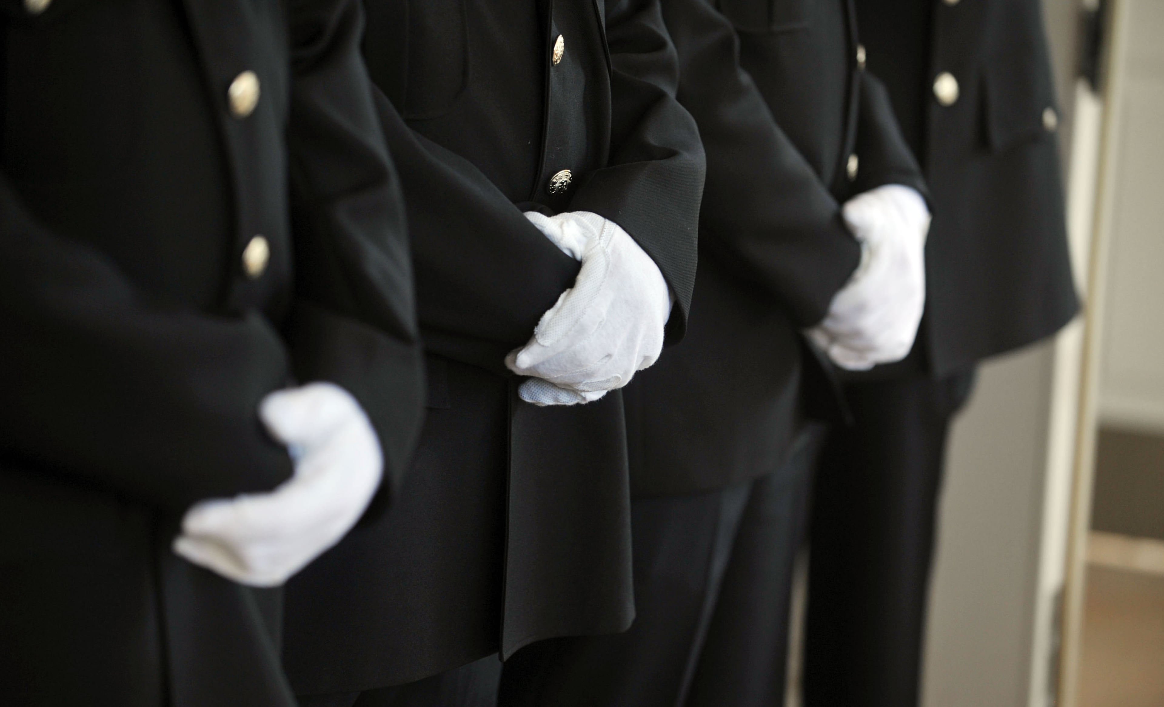 Eatonton police officers stand as part of the honor guard before the service. Police officer Noel Lee Hawk suffered a fatal heart attack shortly after breaking up at a fight at a fast food restaurant in Eatonton May 4. He and several other officers had responded to a dispute between an adult and a juvenile and were able to calm the situation before clearing the scene. A short time later, several family members and friends of the subjects arrived at the location, and a disturbance occurred. Officers responded to the scene again and were placing two subjects under arrest when Officer Hawk suddenly collapsed. CPR was initiated, but he was not able to be revived.