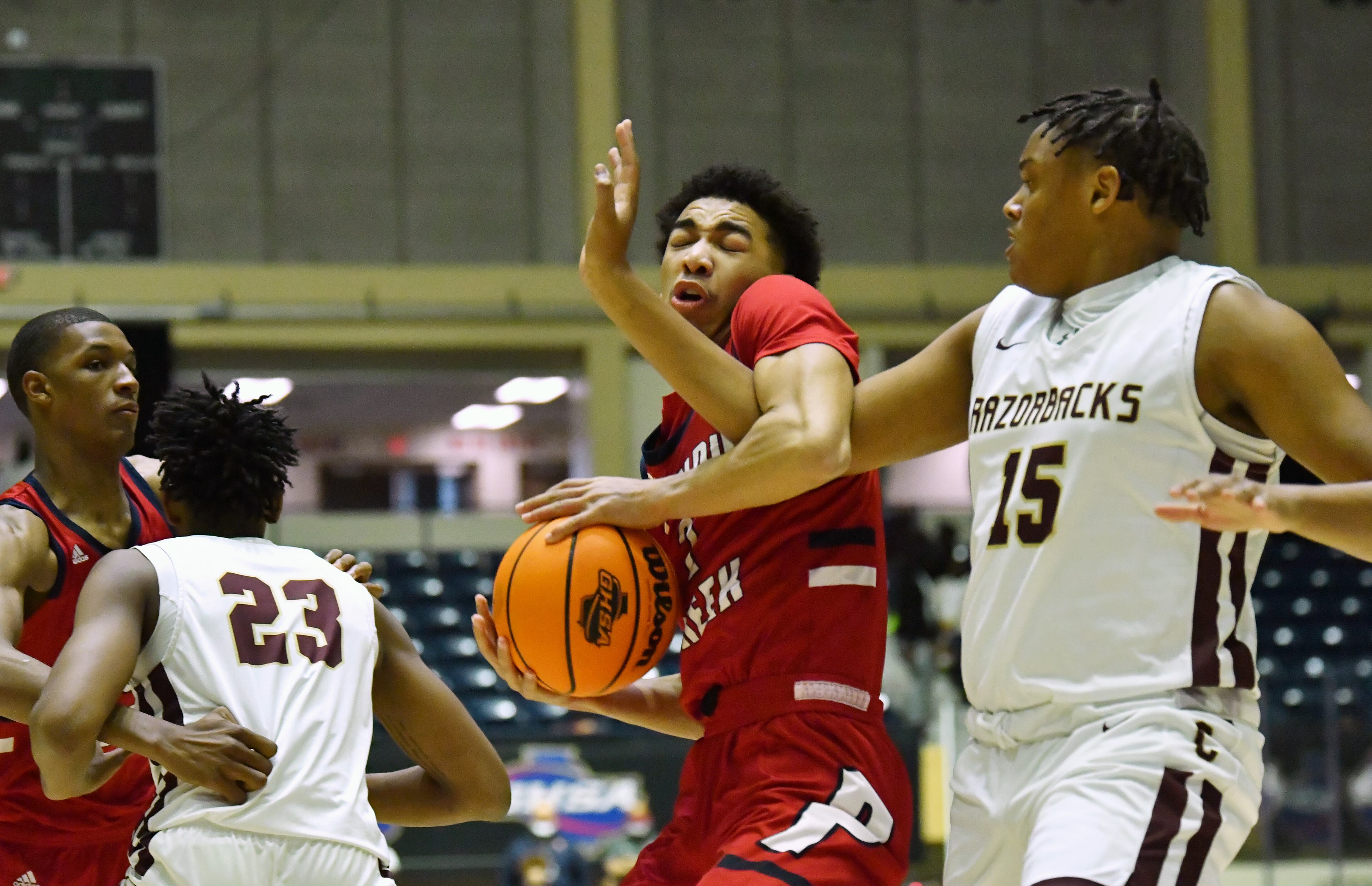 March 12, 2021 Macon - Sandy Creek's Myles Rice (2) reacts as Cross Creek's Corey Trotter (right) tries to steal during the 2021 GHSA State Basketball Class AAA Boys Championship game at the Macon Centreplex in Macon on Friday, March 12, 2021 Cross Creek won 57-49 over Sandy Creek. (Hyosub Shin / Hyosub.Shin@ajc.com)
