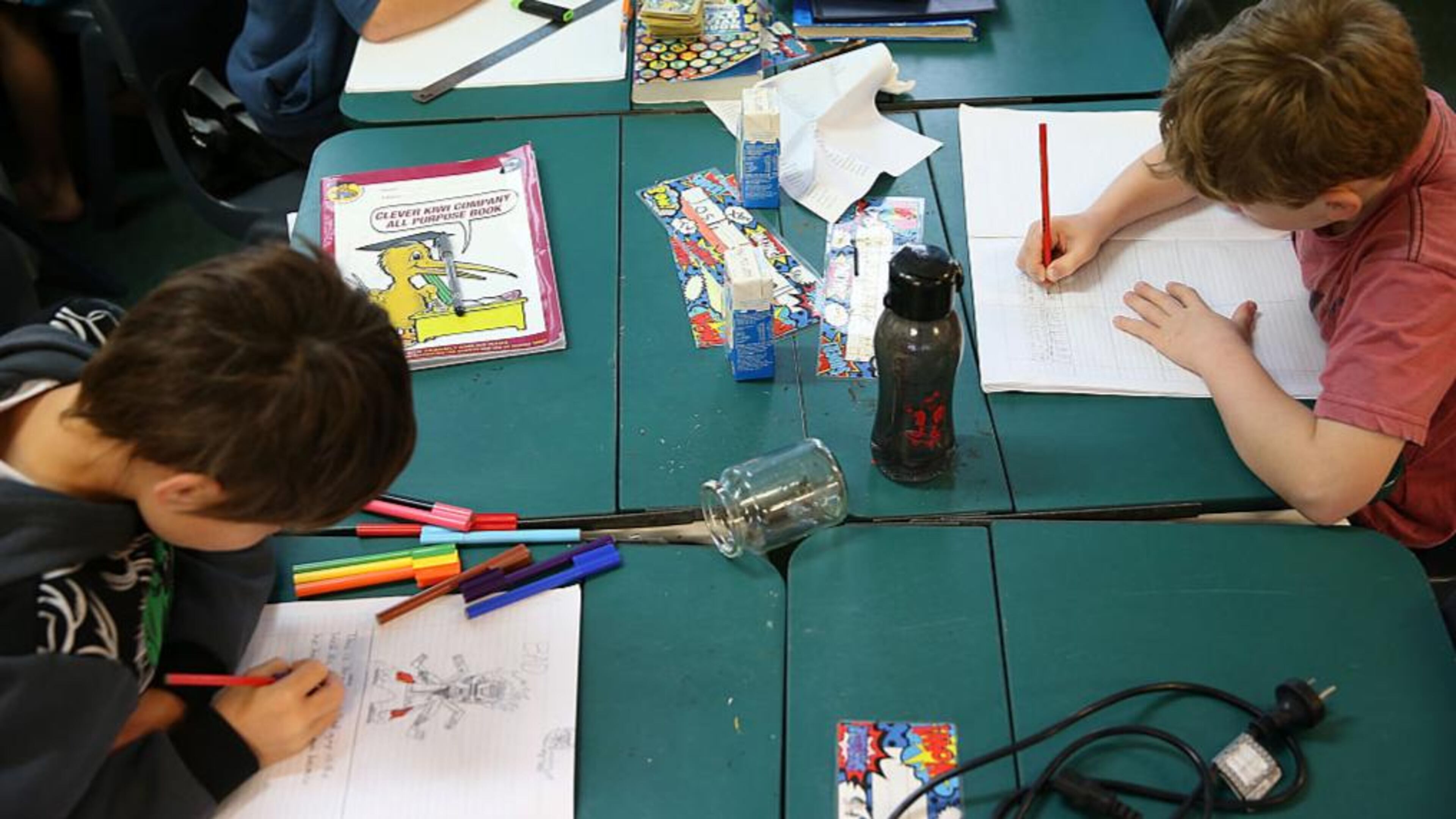 File photo - Students work in a classroom (Photo by Fiona Goodall/Getty Images)