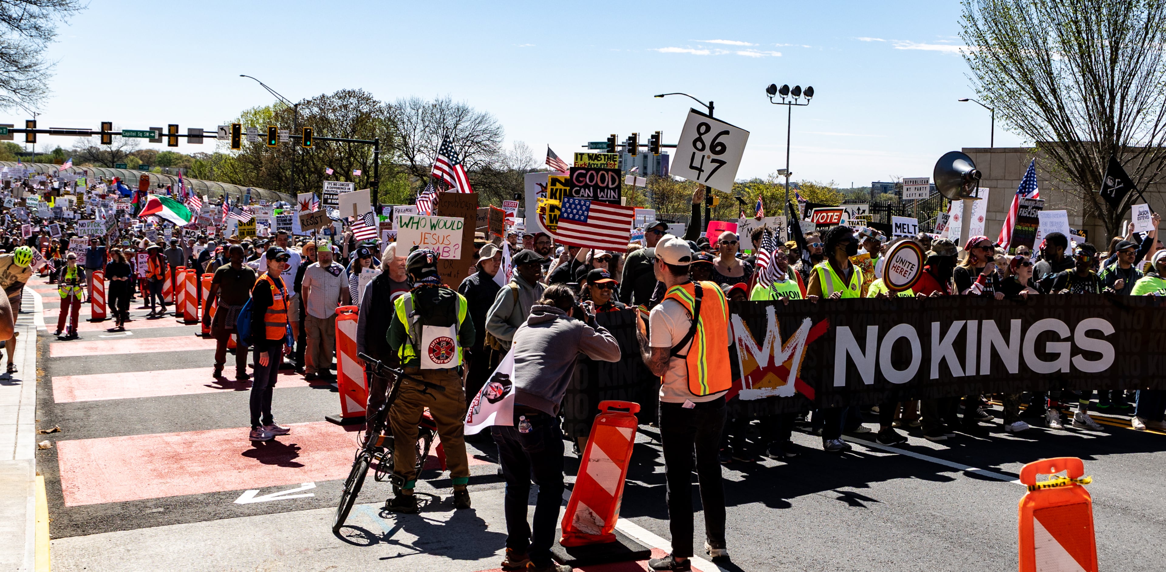 Demonstrators march toward the state Capitol during the No Kings protest on Saturday, March 28, 2026, in Atlanta. (Jenni Girtman for the AJC)