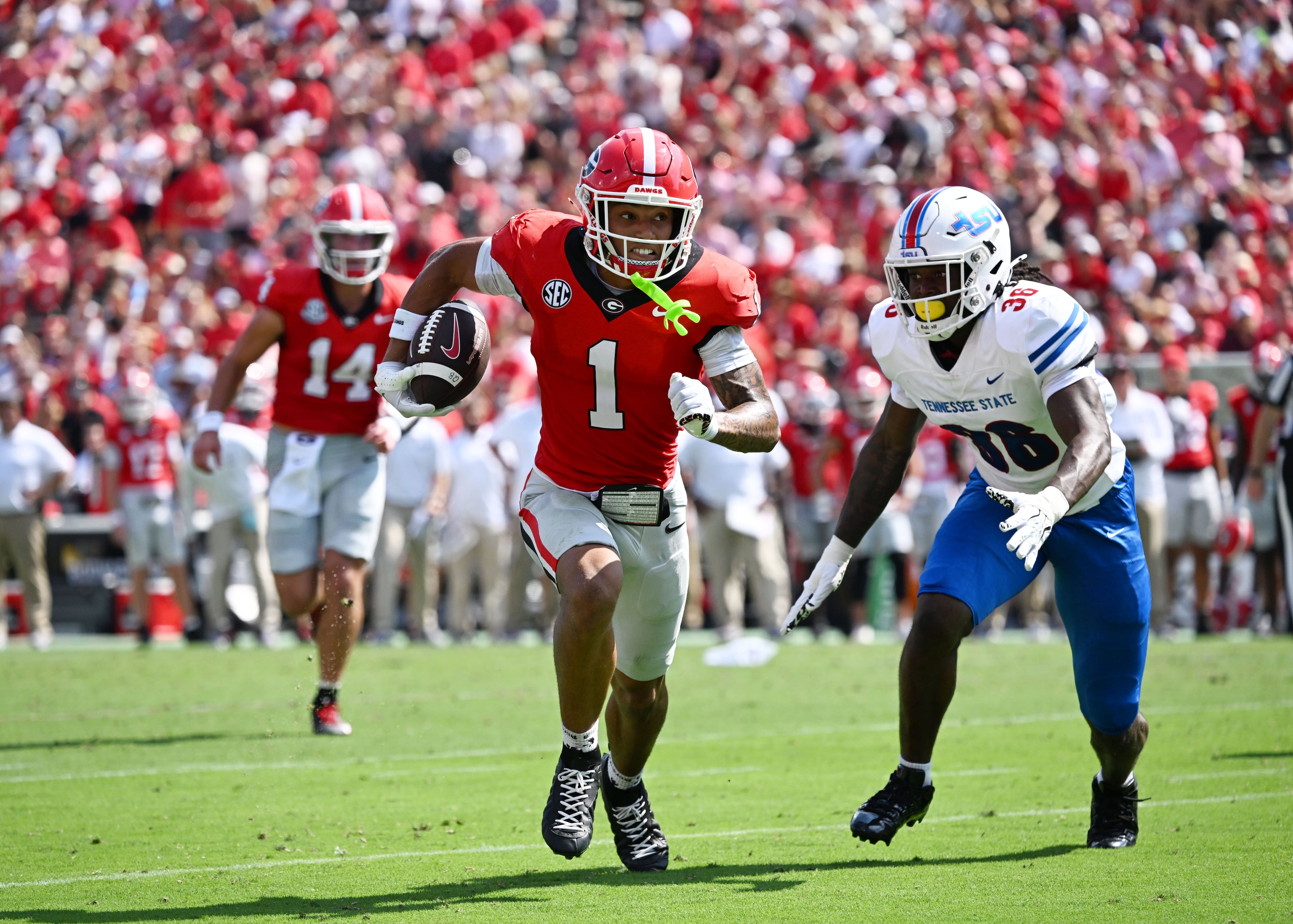Georgia wide receiver Talyn Taylor runs for a touchdown during the first half in an NCAA football game vs. Tennessee State at Sanford Stadium on Saturday, Sept. 5, 2026, in Athens, Ga. (Hyosub Shin/AJC)