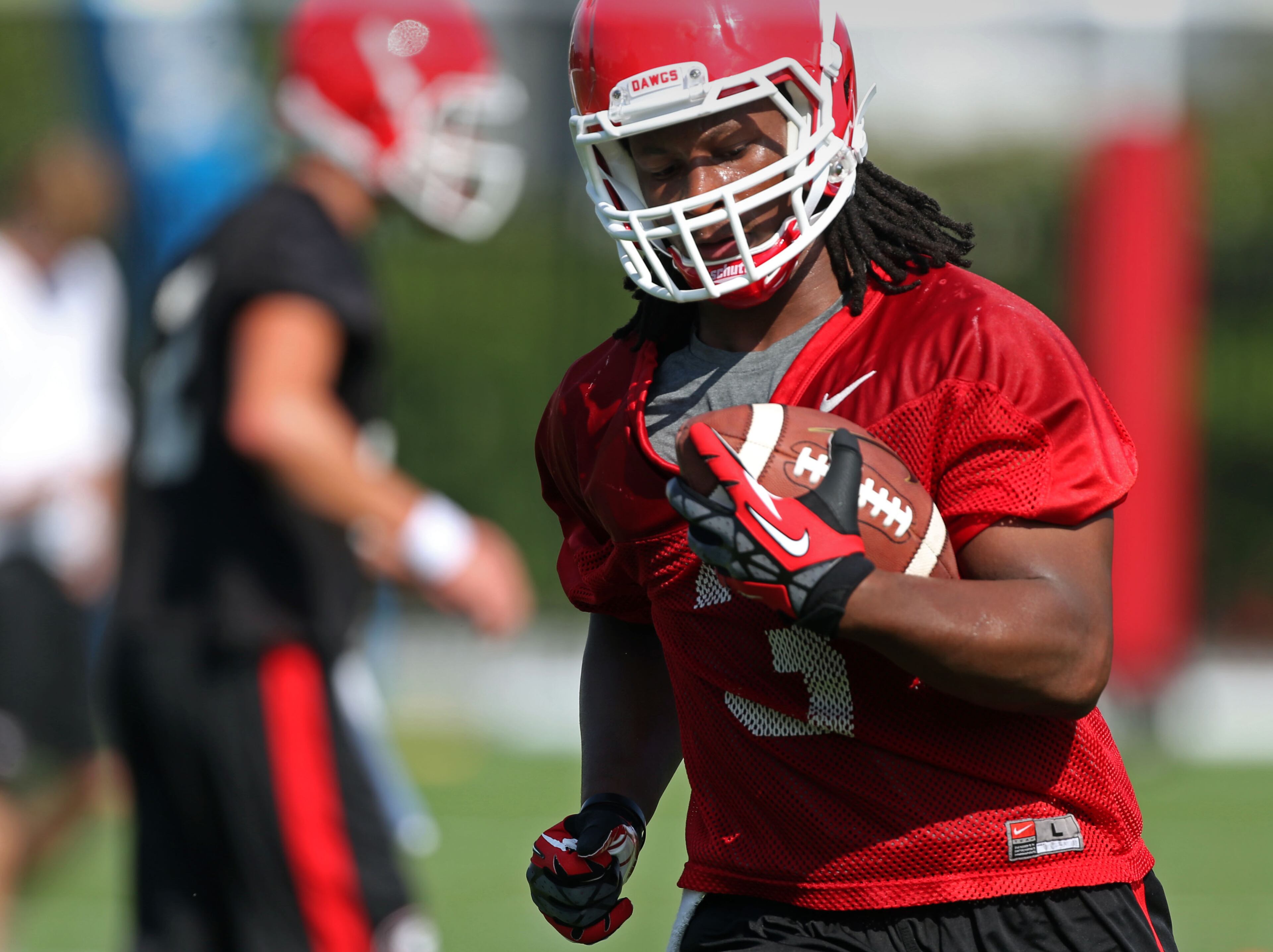 University of Georgia tailback Todd Gurley (3) runs a drill during the first day of practice at the University of Georgia Thursday afternoon in Athens, Ga., August 1, 2013. JASON GETZ / JGETZ@AJC.COM