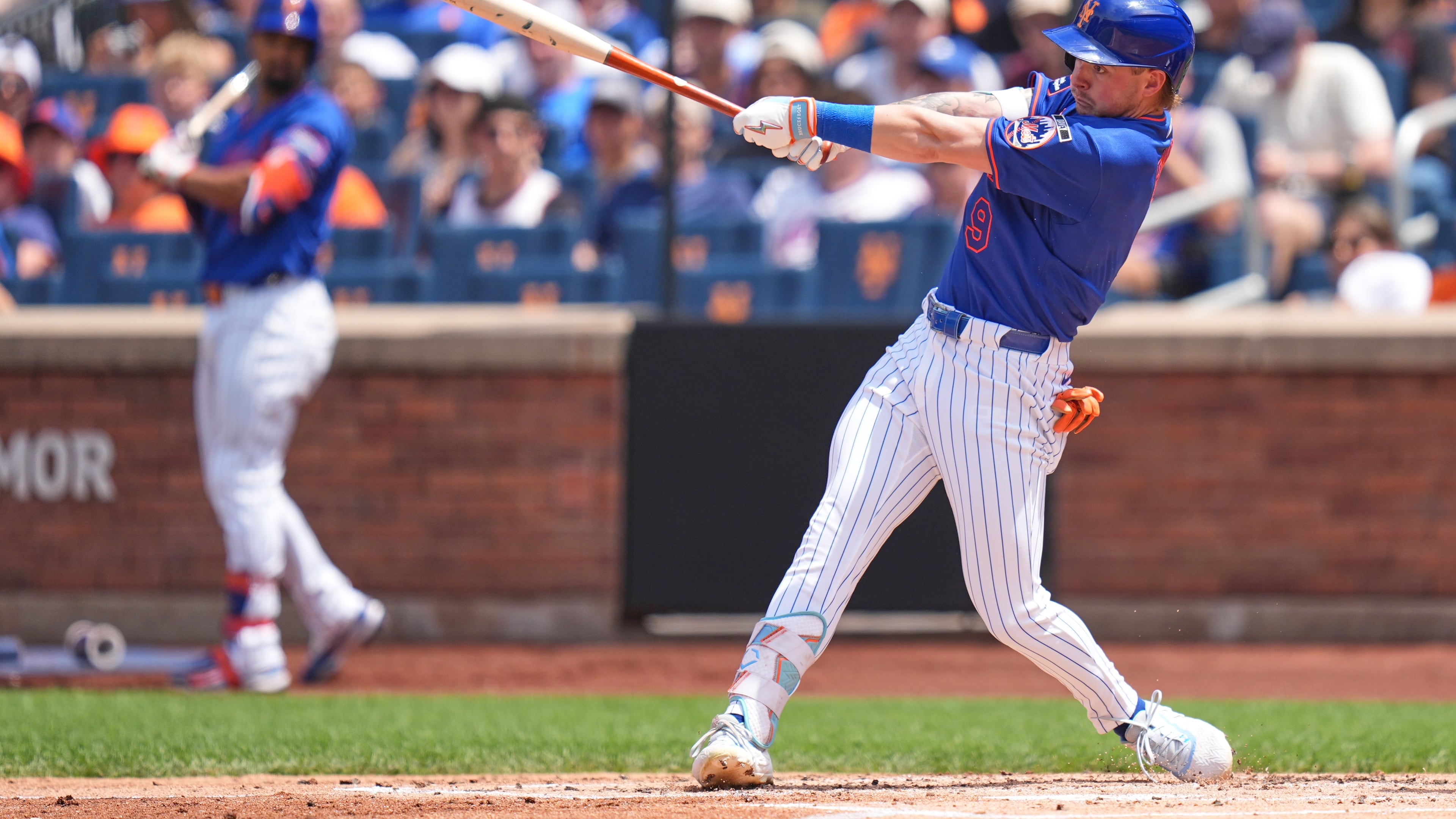 New York Mets' A.J. Ewing hits a two-run double during the first inning of a baseball game against the Atlanta Braves, Sunday, June 14, 2026, in New York. (AP Photo/Seth Wenig)