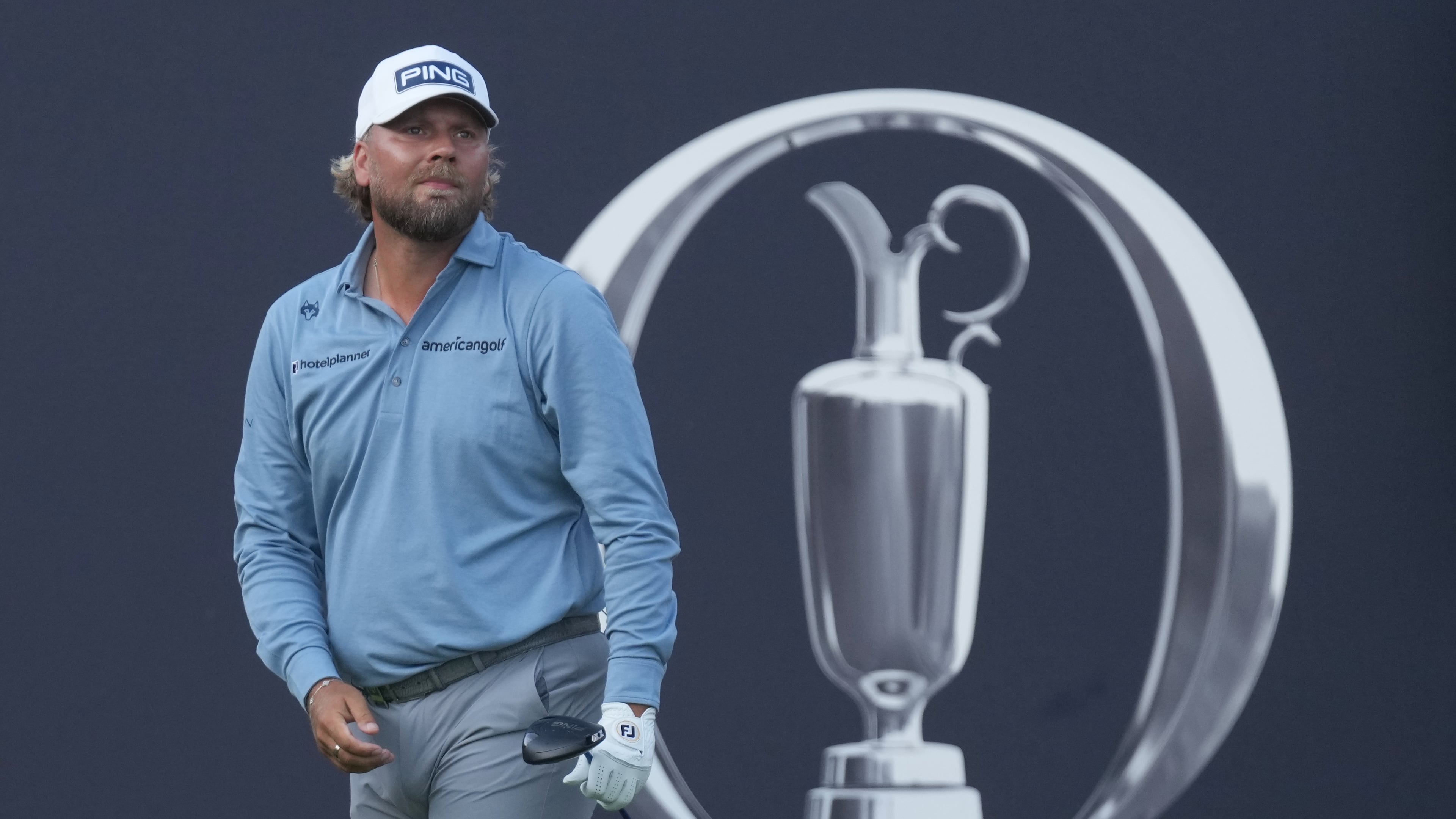 Daniel Brown of England watches where his shot has landed after playing off the 1st tee during the first day of the British Open Golf championships at Royal Birkdale golf club, in Southport, England, Thursday, July 16, 2026. (AP Photo/Jon Super)