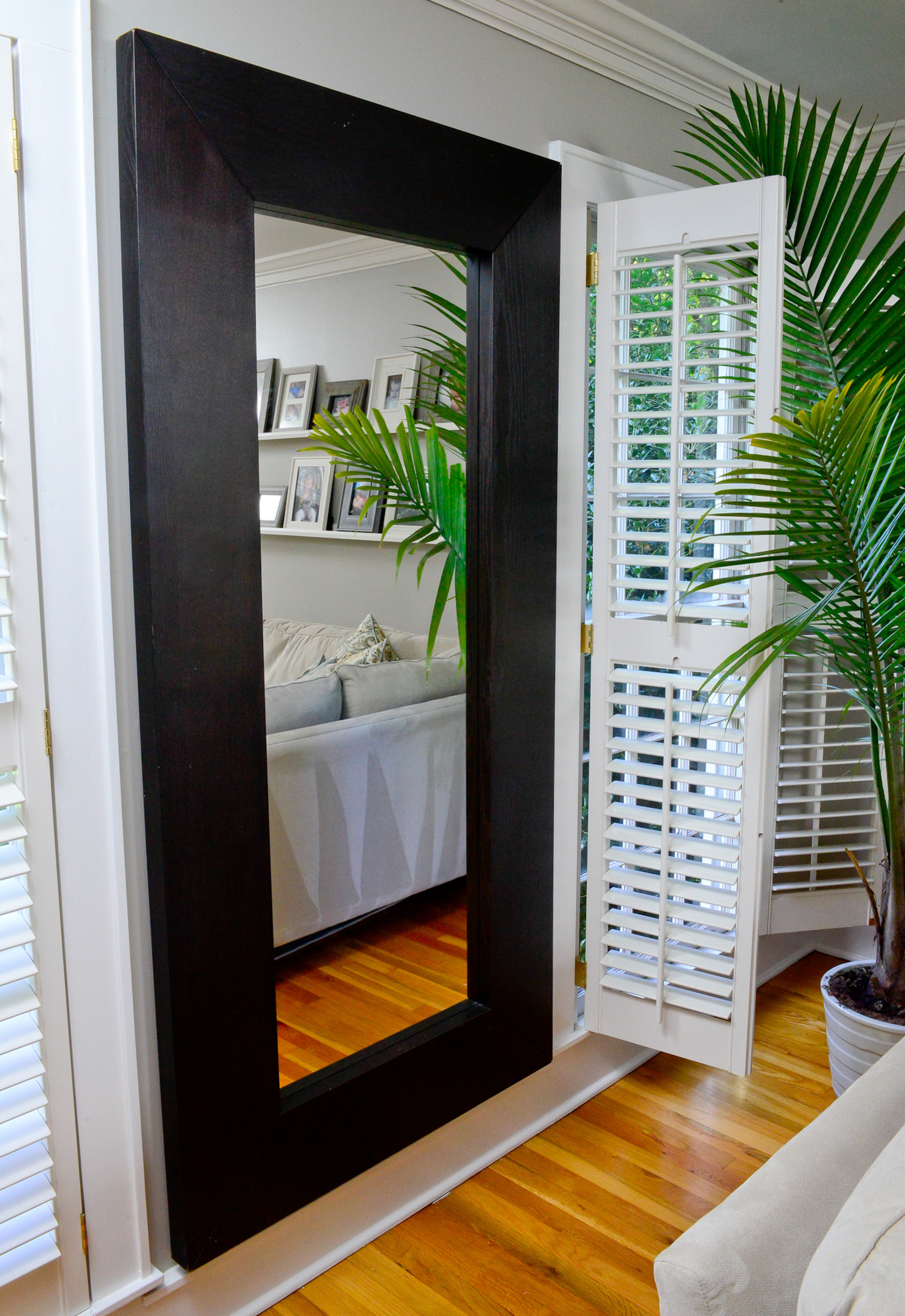 A mirror from IKEA fills the space in the family room and helps make the room feel larger, said homeowner Renee Morehouse.