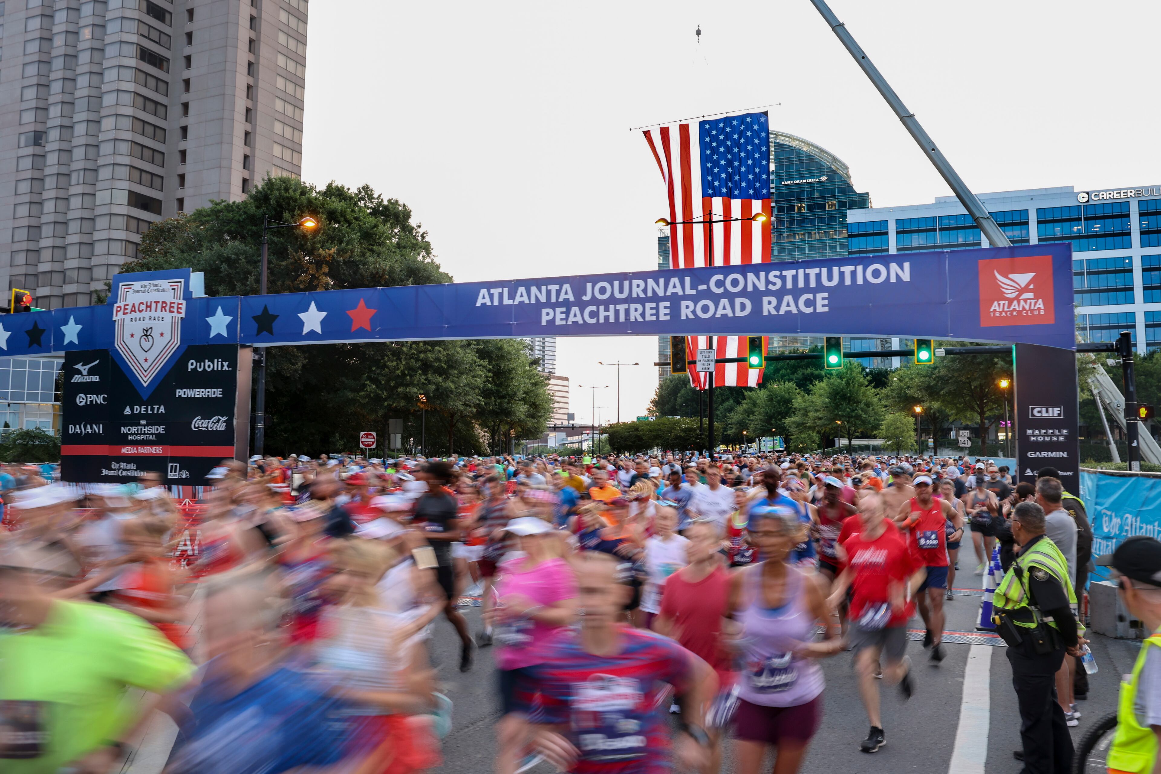 7/3/21 - Atlanta, GA - Runners at the start as the AJC Peachtree Road Race returned in-person Saturday for the holiday tradition. (Jason Getz for the Atlanta Journal-Constitution)