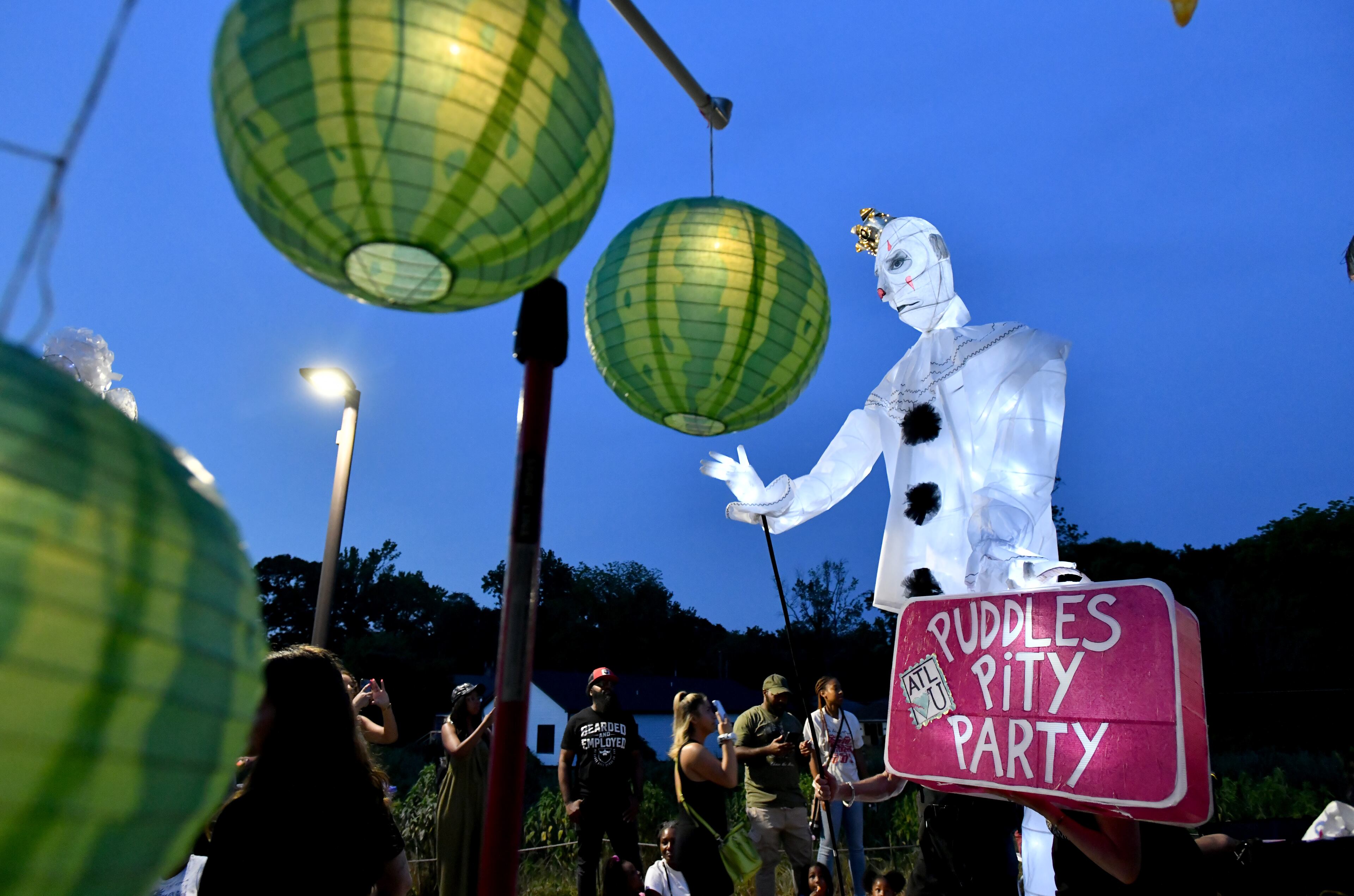 After a two-year hiatus because of the pandemic, thousands of participants and onlookers enjoy the Atlanta Beltline Lantern Parade on the Westside Trail on Saturday night, May 21, 2022. (Hyosub Shin / Hyosub.Shin@ajc.com)