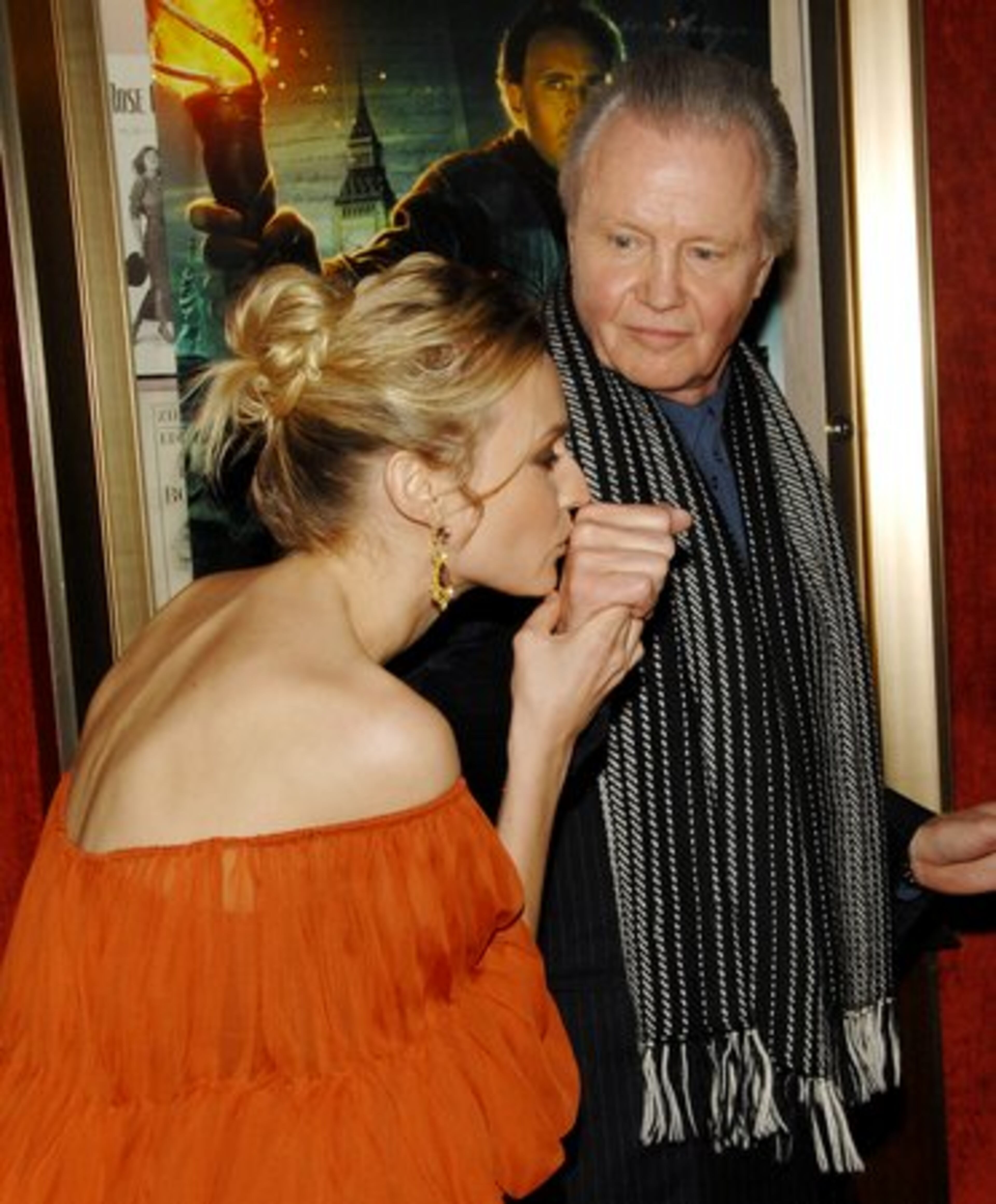 Hot stuff! Voight gets a surprise smooch from co-star Kruger.