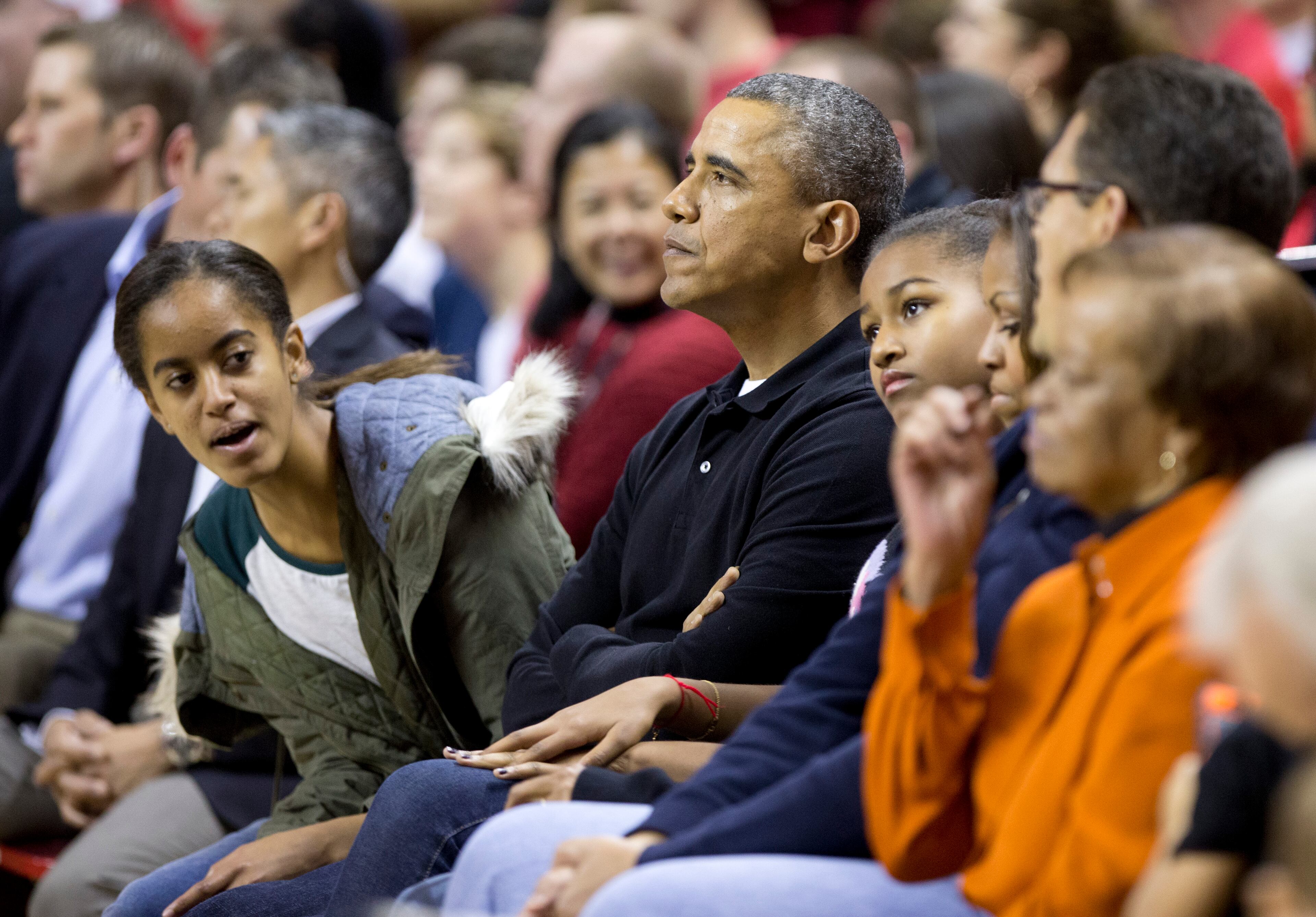 President Barack Obama, center, with first lady Michelle Obama, and their daughters Malia, left, and Sasha, third from left, and mother-in-law Marian Robinson, right.