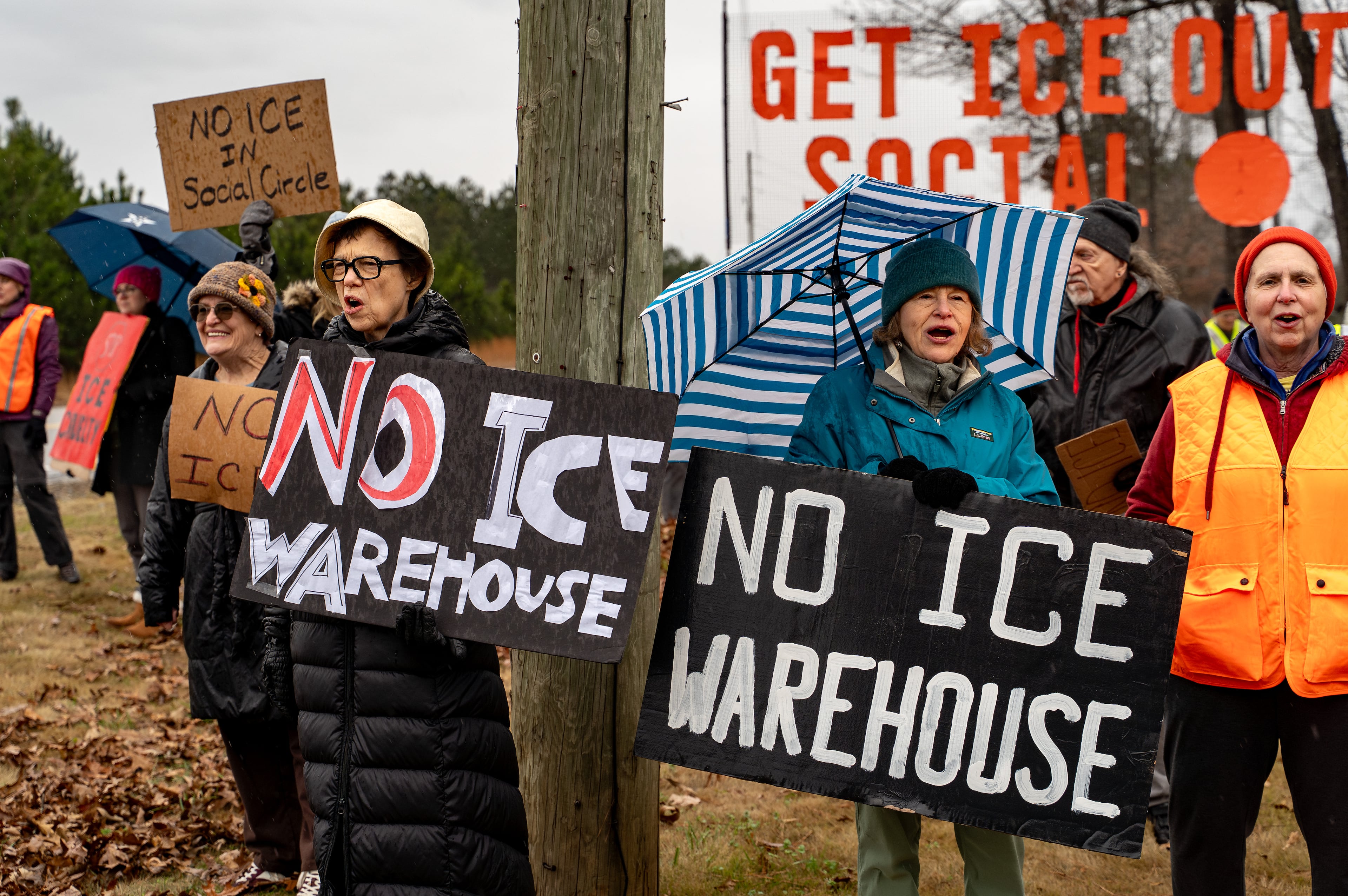 Anti-ICE protesters gather on Social Circle Parkway in the city of Social Circle to voice opposition to potential Immigration and Customs Enforcement facility