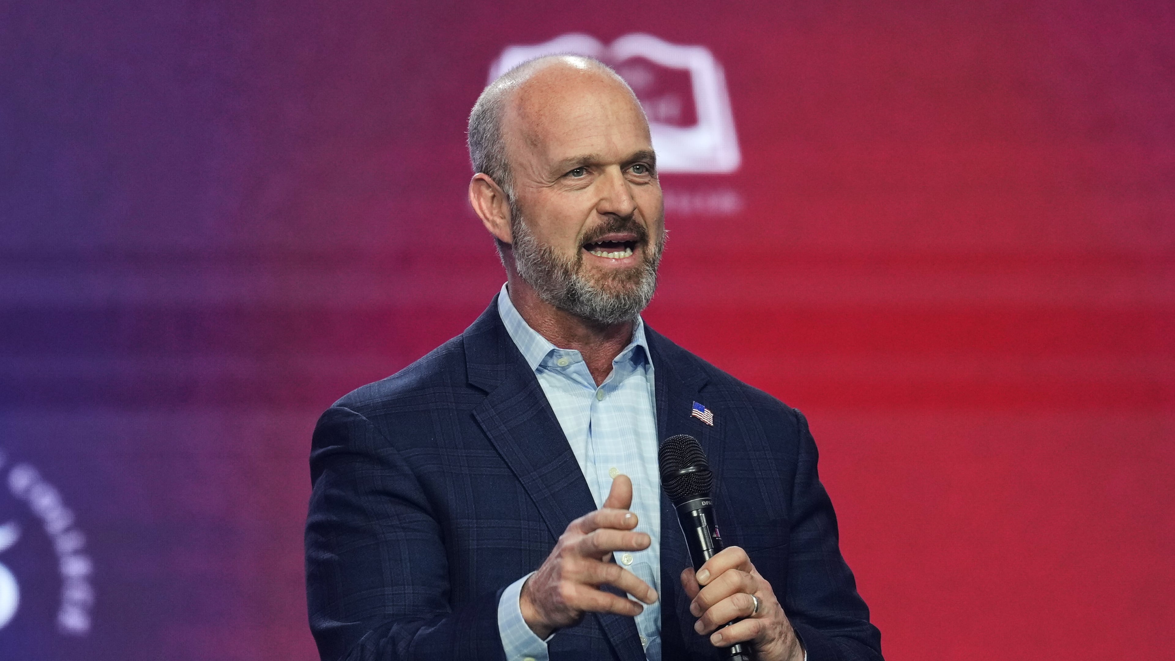Kevin Roberts, president of The Heritage Foundation, speaks during Turning Point USA's AmericaFest 2025, Friday, Dec. 19, 2025, in Phoenix. (AP Photo/Ross D. Franklin)