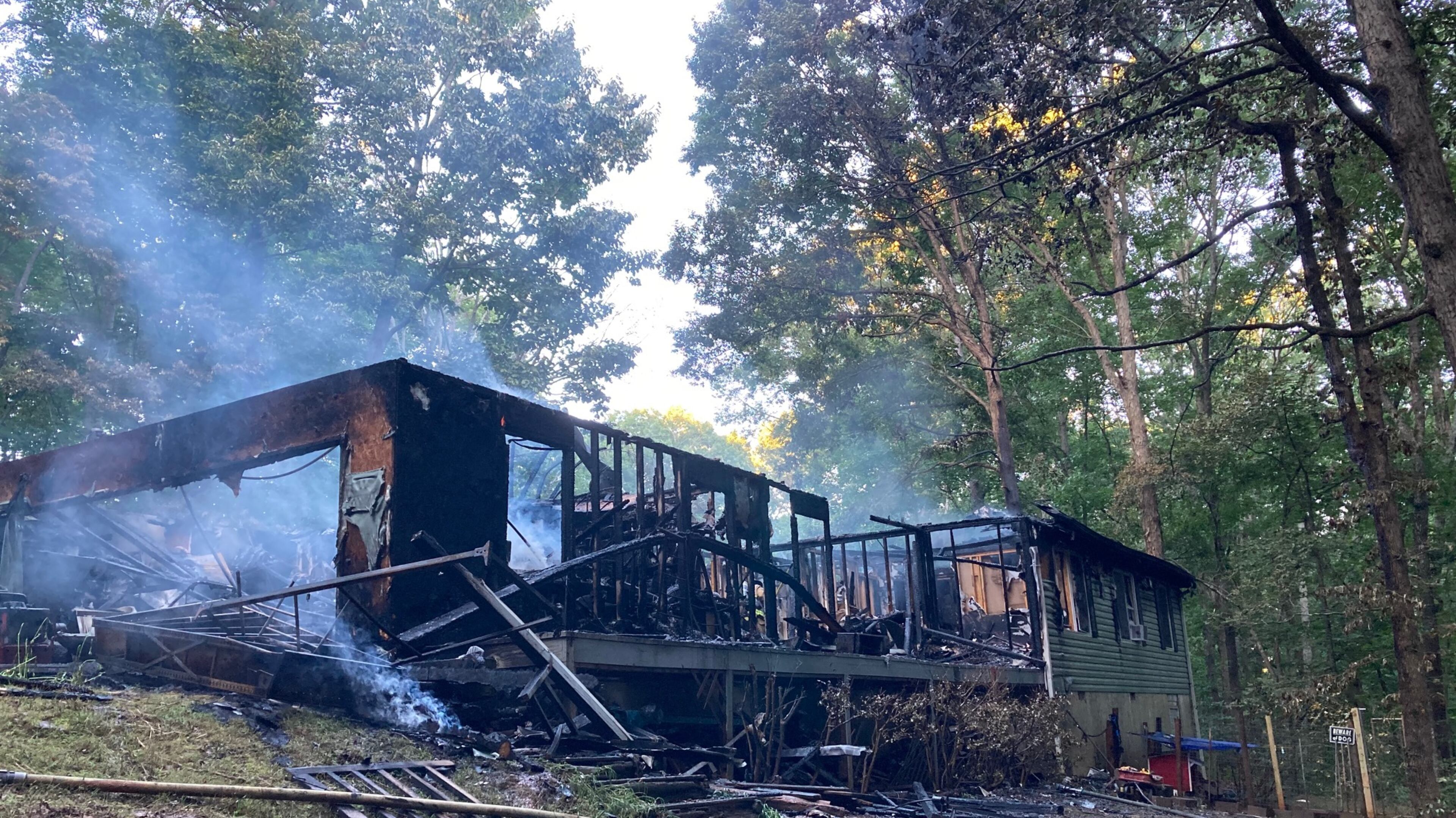 Flames were already shooting into the attic when firefighters arrived at the Hillside Drive home in Paulding County, fire officials said.