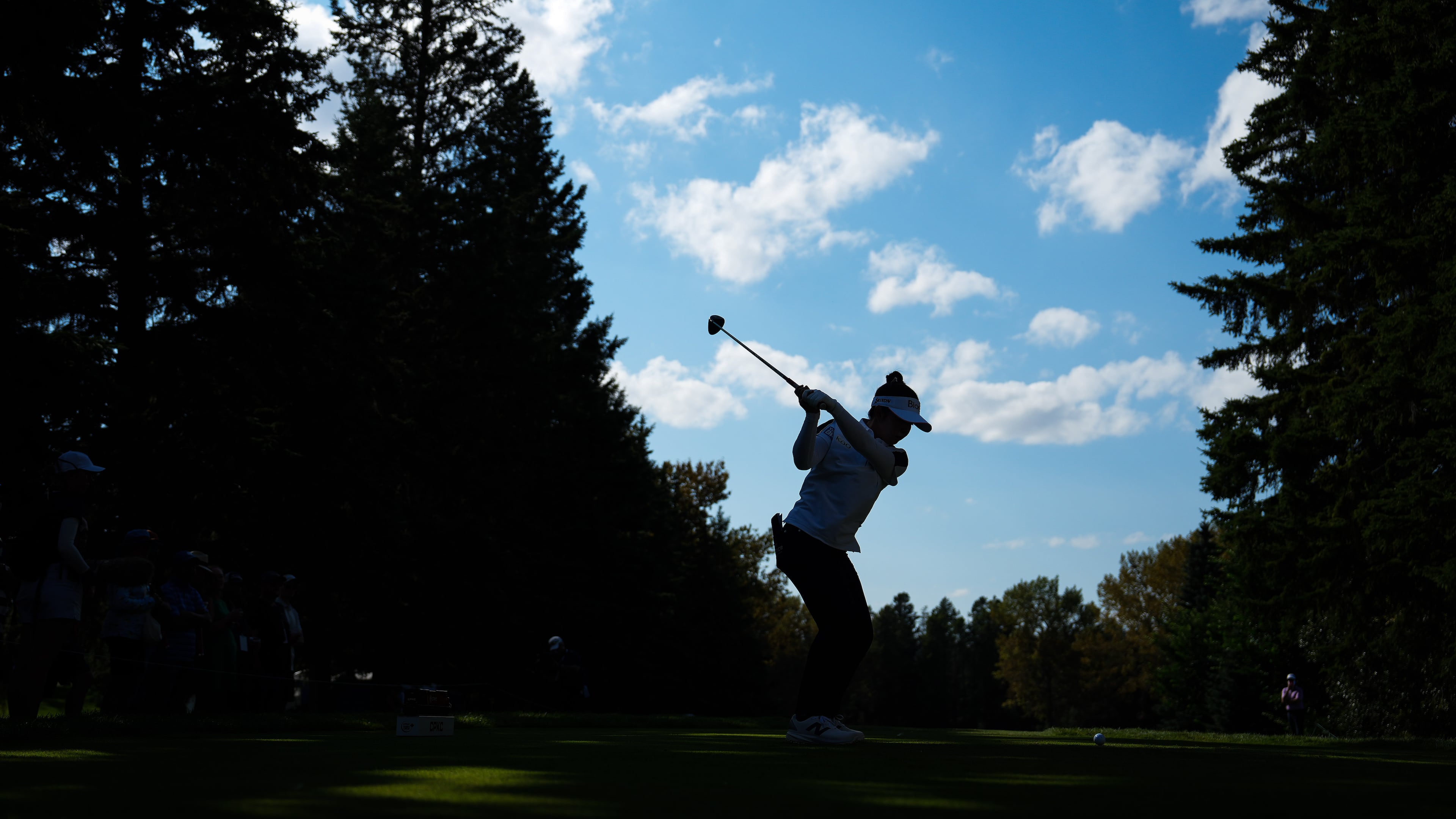 Miyu Yamashita, of Japan, hits her tee shot on the 12th hole during the second round at the LPGA Canadian Women's Open golf tournament in Edmonton, Alberta, Friday, Aug. 21, 2026. (Darryl Dyck/The Canadian Press via AP)