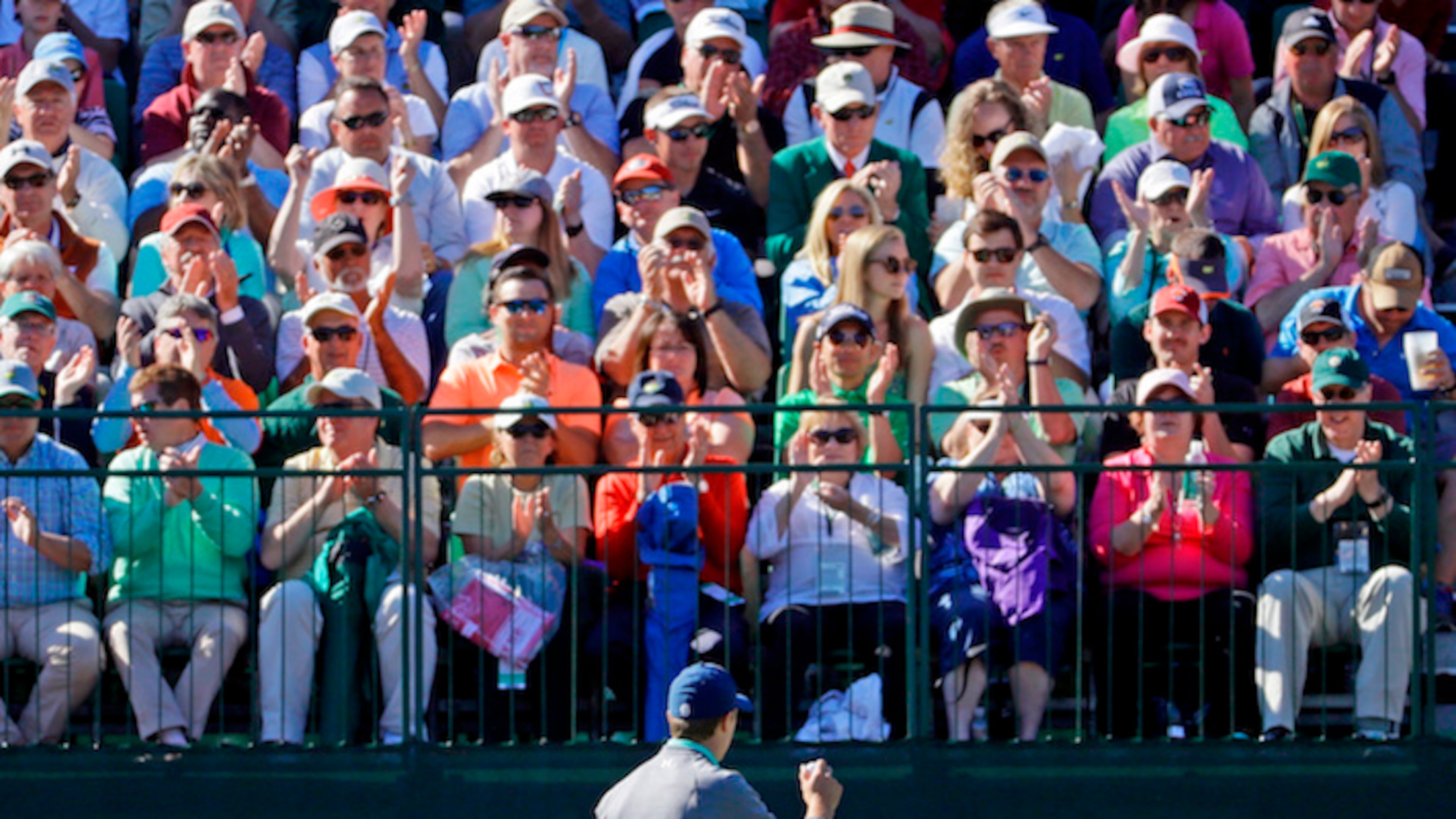Jordan Spieth holds up his ball to the gallery after a birdie on the eighth hole during the third round of the Masters golf tournament Saturday, April 9, 2016, in Augusta, Ga. (AP Photo/Chris Carlson)
