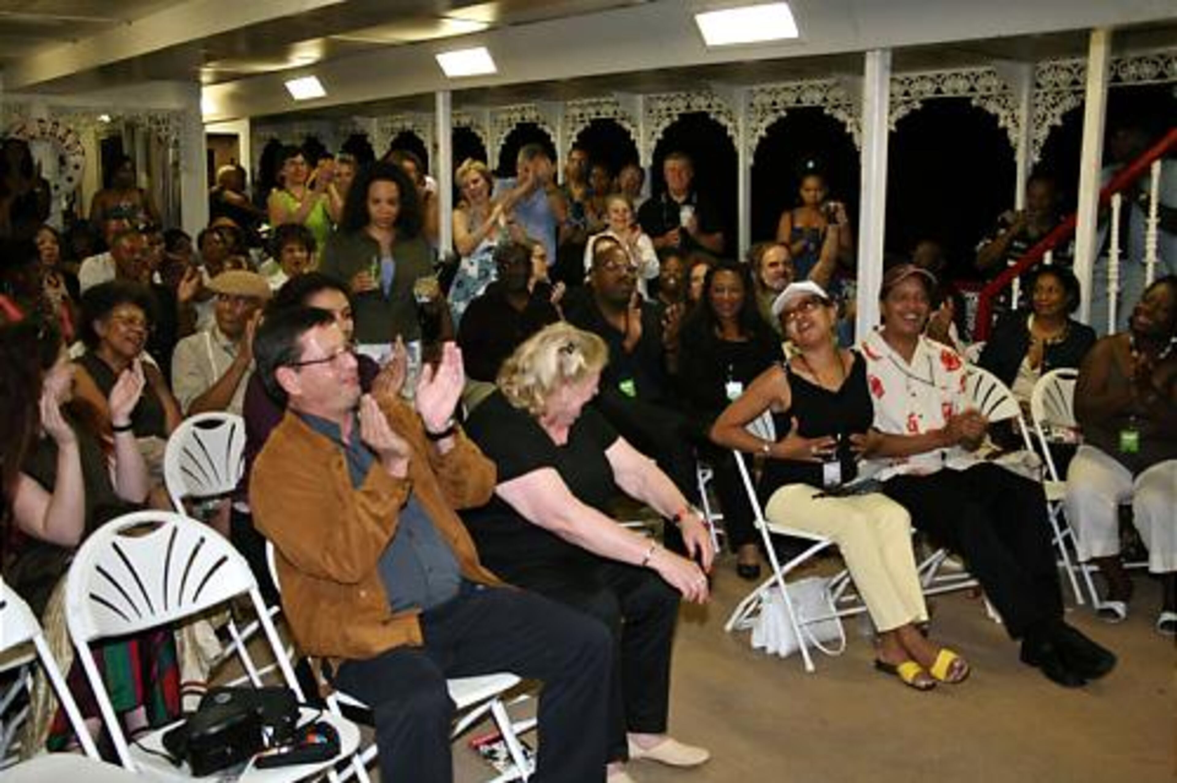 The three-hour excursion featured a BBQ buffet, mint juleps, music and dancing as the boat circled Stone Mountain Park.