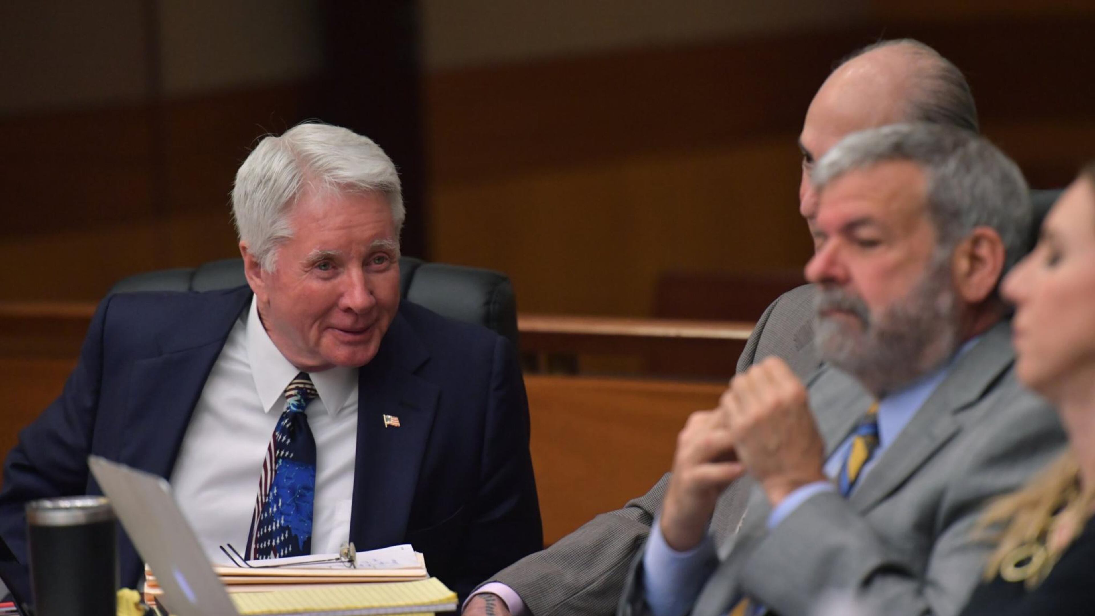 March 27, 2018 Atlanta - Tex McIver smiles as he sits with his defense team during Day 11 of the Tex McIver murder trial at Fulton County Courthouse on Tuesday, March 27, 2018. HYOSUB SHIN / HSHIN@AJC.COM