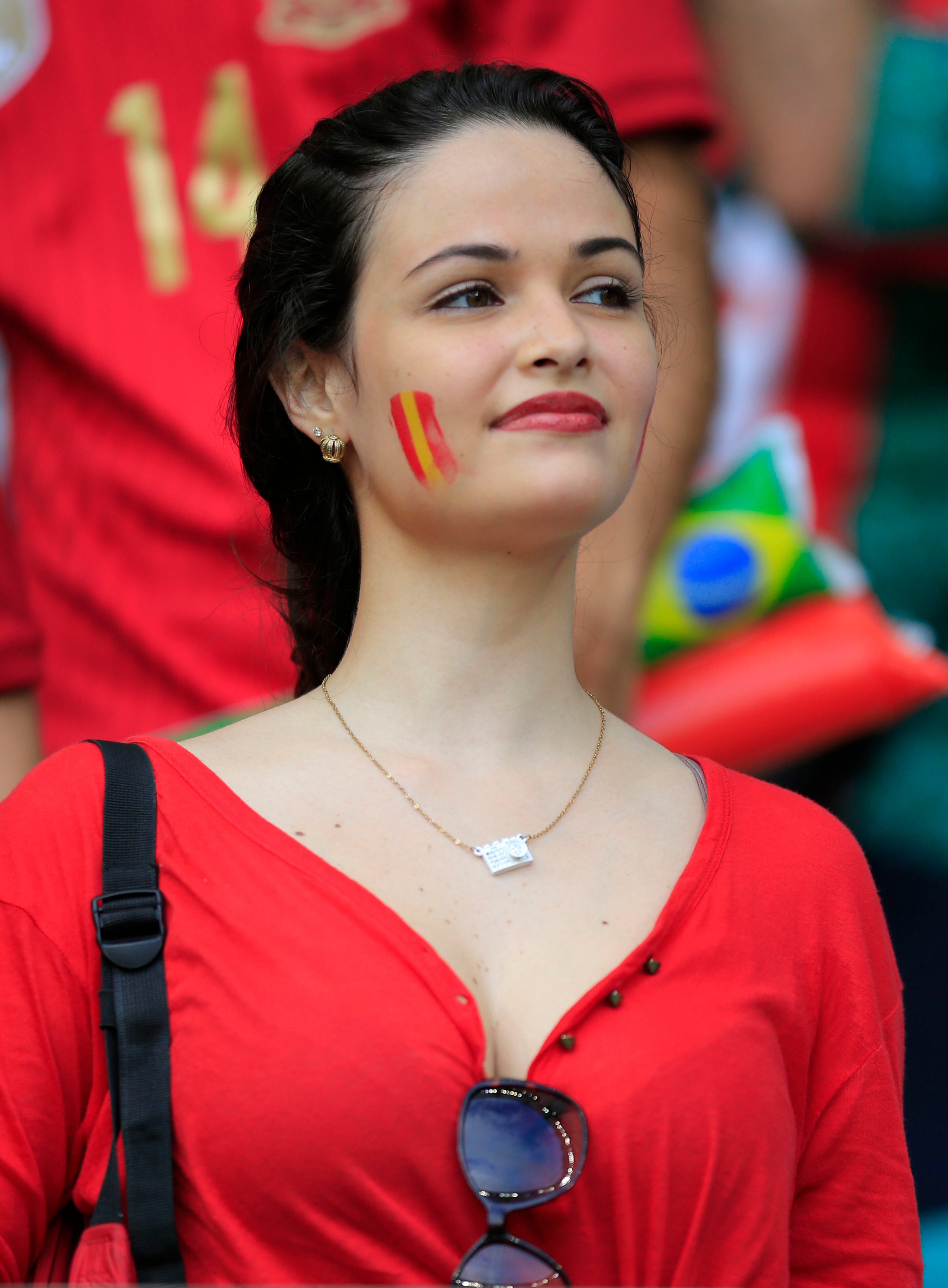 A Spanish soccer team supporter waits for the start of the group B World Cup soccer match between Spain and the Netherlands at the Arena Ponte Nova in Salvador, Brazil, Friday, June 13, 2014. (AP Photo/Bernat Armangue)