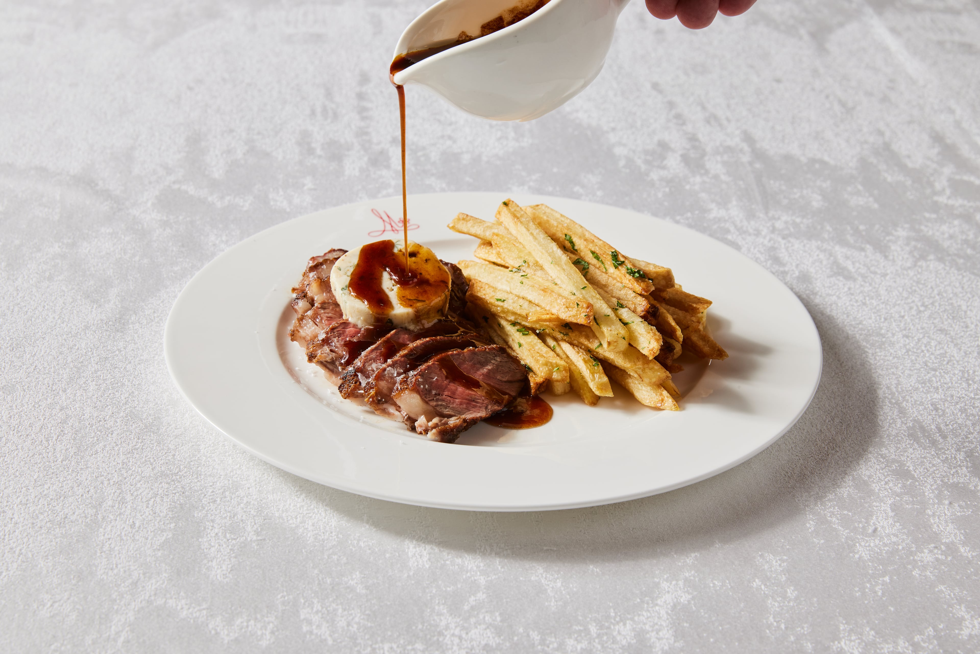 Steak frites is on the menu at Brasserie Margot at the Four Seasons Hotel Atlanta. (Courtesy of Kathryn McCrary)