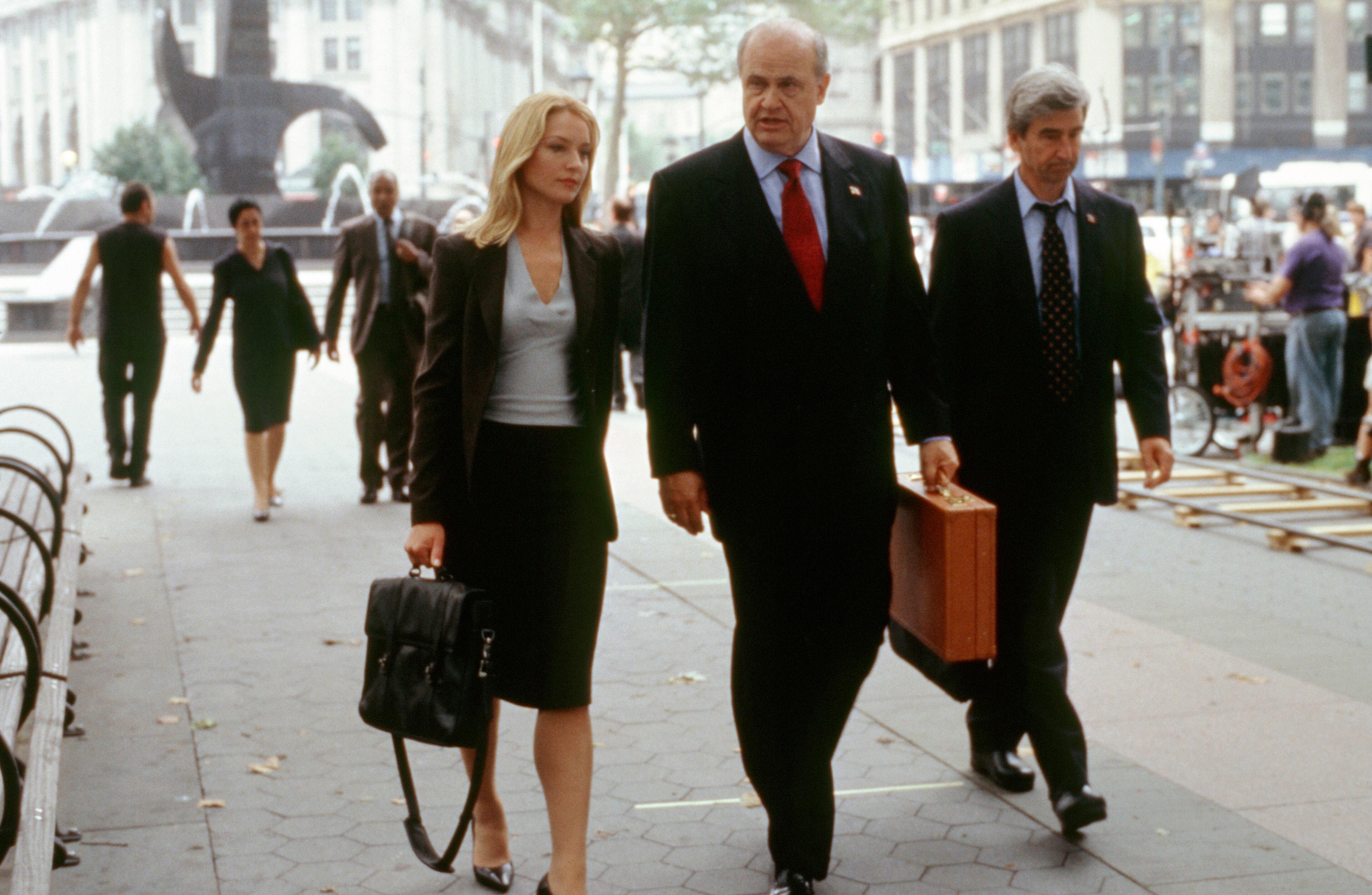 LAW & ORDER -- "Bounty" Episode 2 -- Air Date 10/01/2003 -- Pictured: (l-r) Elisabeth Rohm as Assistant District Attorney Serena Southerlyn, Fred Dalton Thompson as District Attorney Arthur Branch, Sam Waterston as Executive Assistant District Attorney Jack McCoy (Photo by Jessica Burstein/NBC/NBCU Photo Bank via Getty Images)