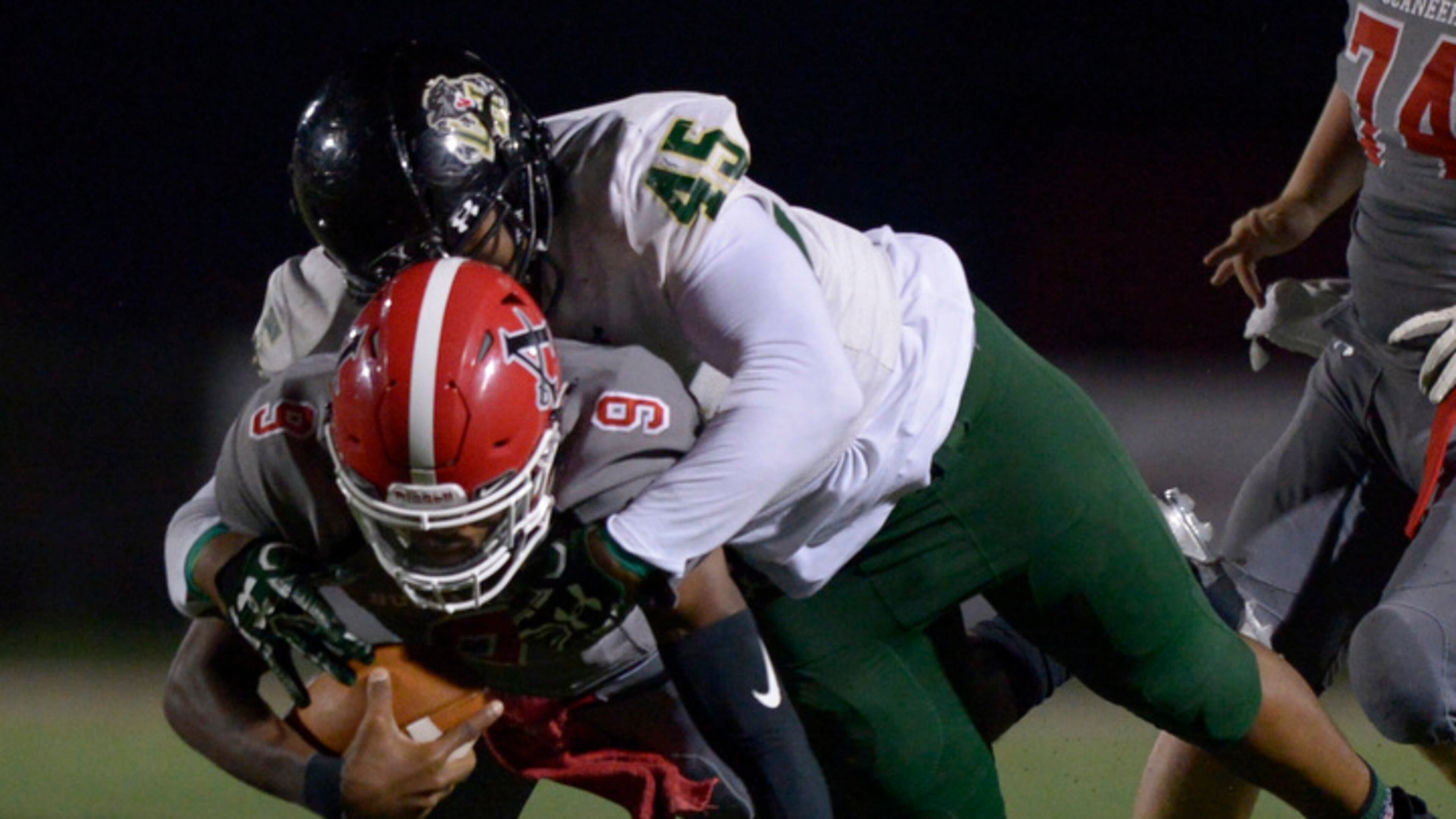 Langston Hughes senior Algie Richardson (45) sacks Allatoona sophomore QB Dante Marshal (9) in the first half of their game at Allatoona High School Friday, November 10, 2017. Special/Daniel Varnado
