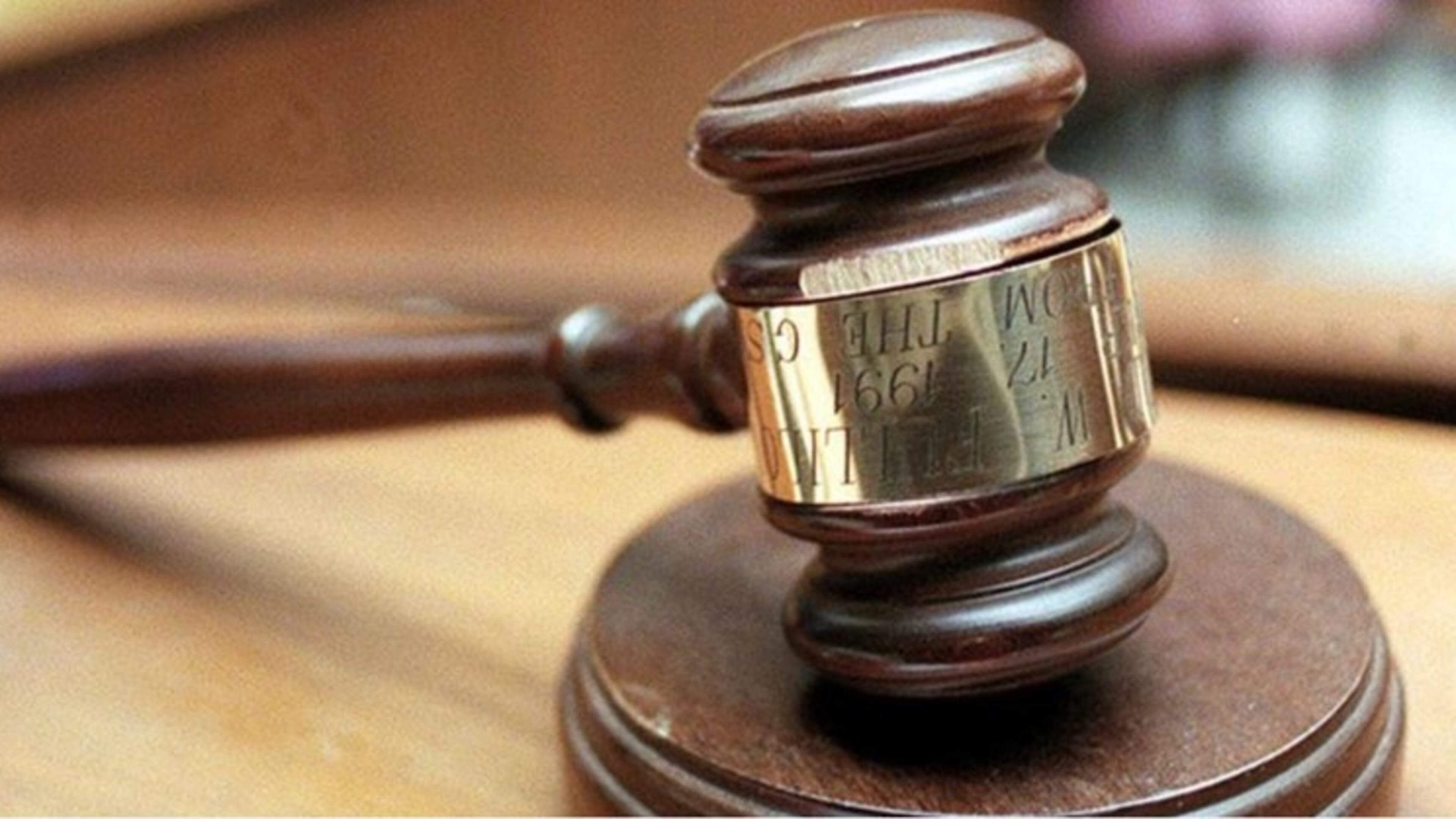 An ex-Cartersville cop was sentenced to 18 months in federal prison, authorities said.