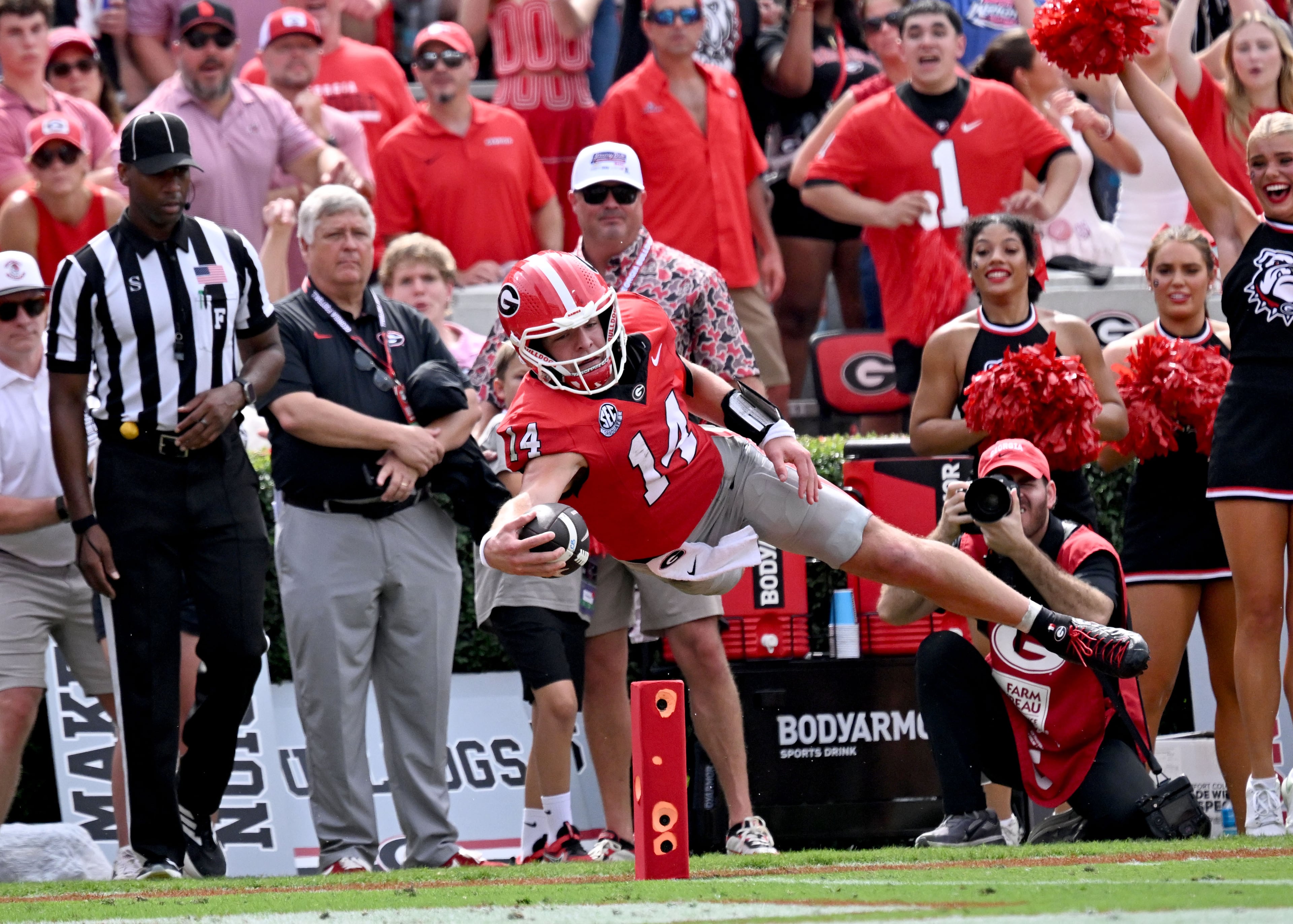 Georgia quarterback Gunner Stockton (14) dives near the endzone for extra yardage during the second half of an NCAA football game against Vanderbilt at Sanford Stadium on Saturday, Oct. 3, 2026, in Athens. Georgia won 38-14 over Vanderbilt. (Hyosub Shin/AJC)